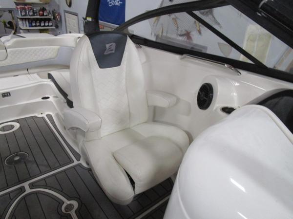 2017 Larson 292 LXI boat interior with white seating and modern design.
