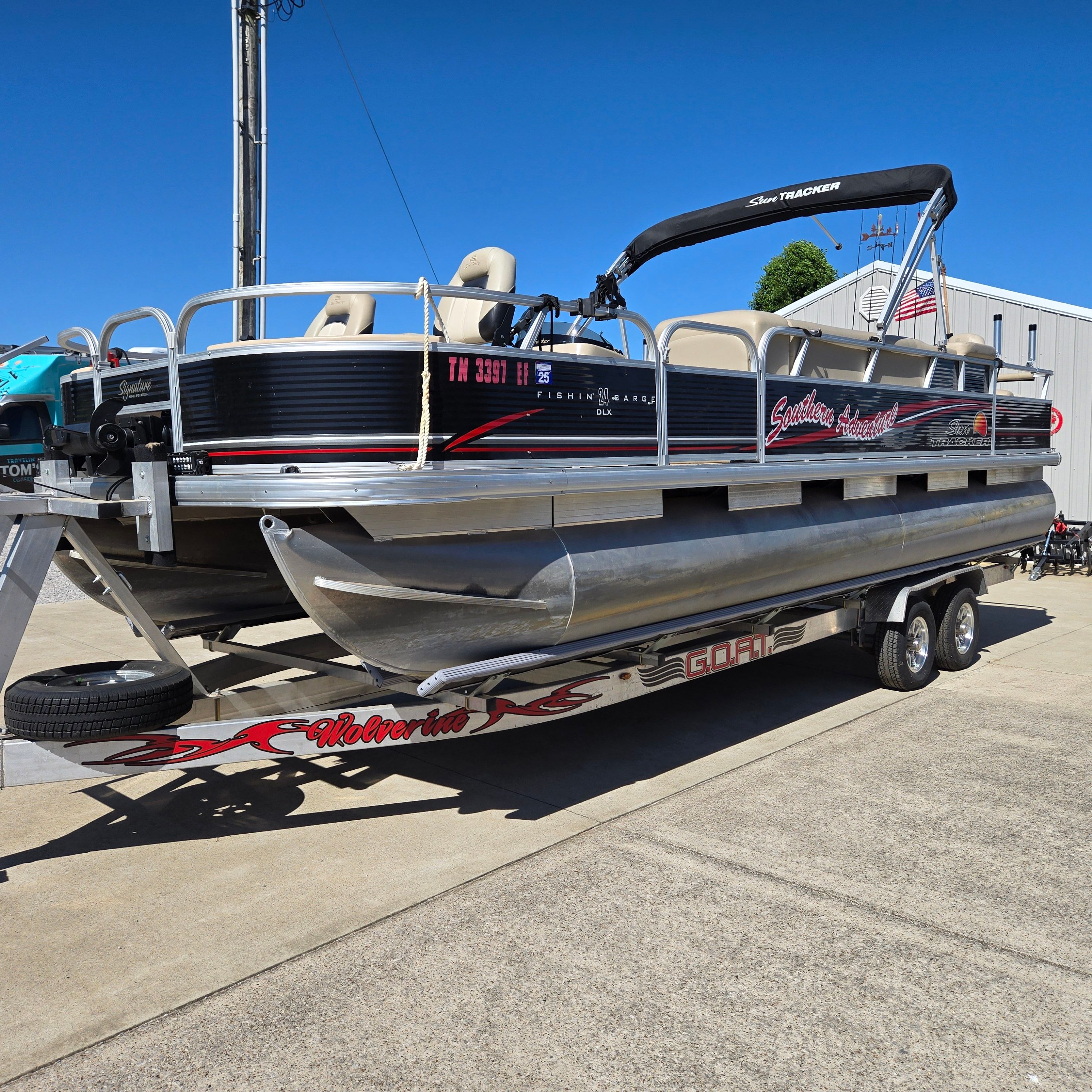 2012 Sun Tracker Fishin' Barge 24 DLX on trailer