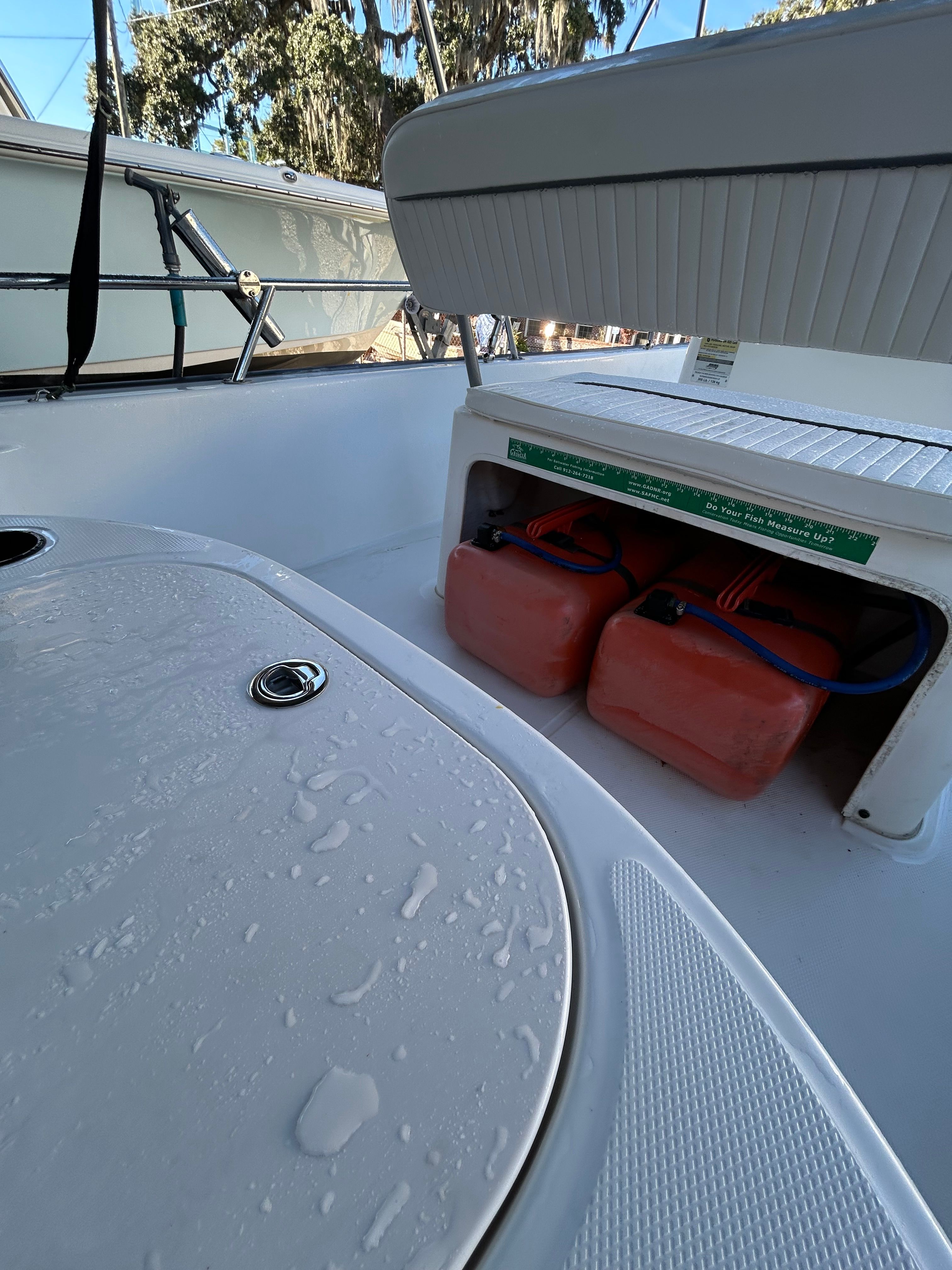 Boston Whaler 150 Montauk 2006 with storage and fuel canisters.
