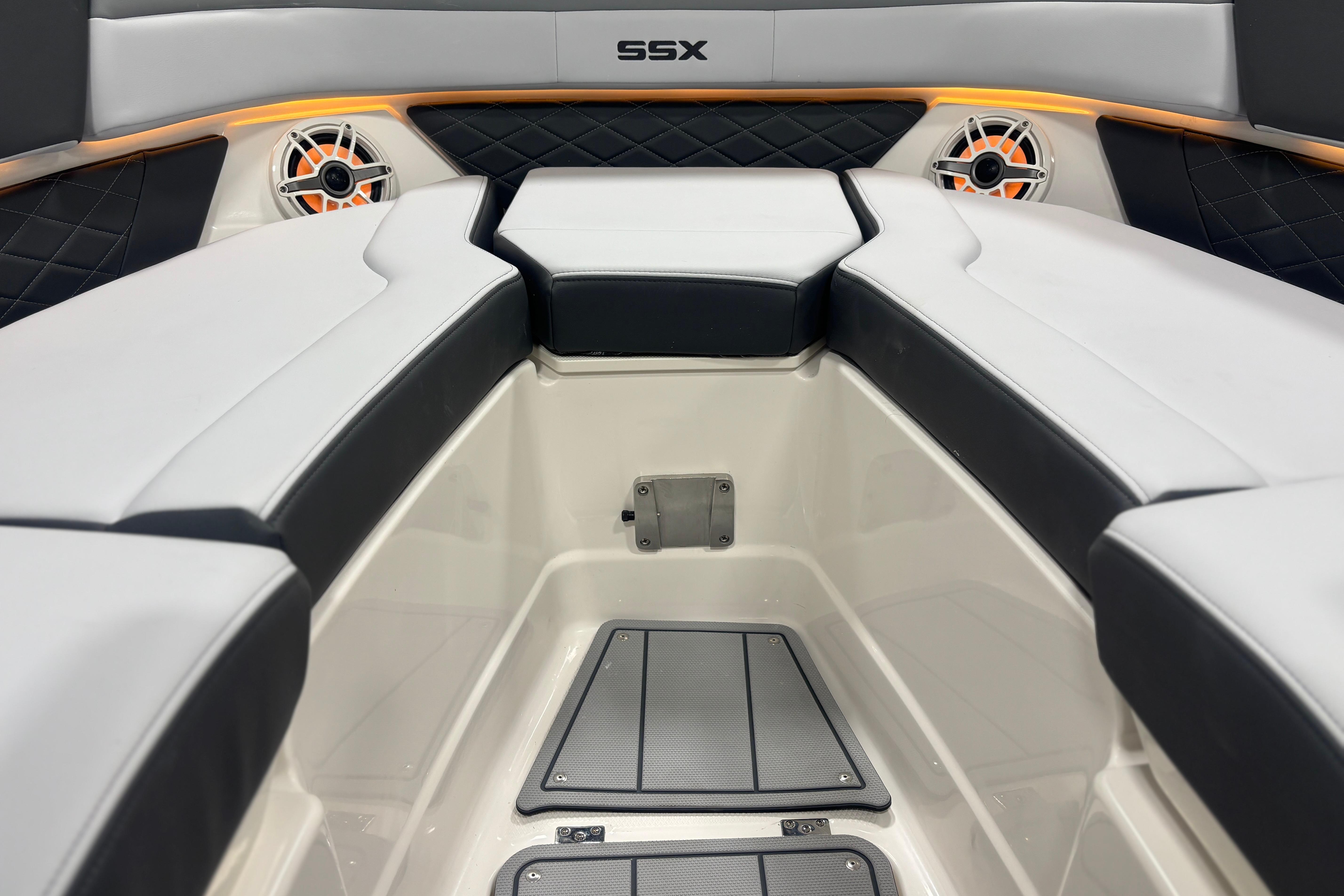 2026 Chaparral SSX 30 boat interior with cushioned seating and built-in speakers.