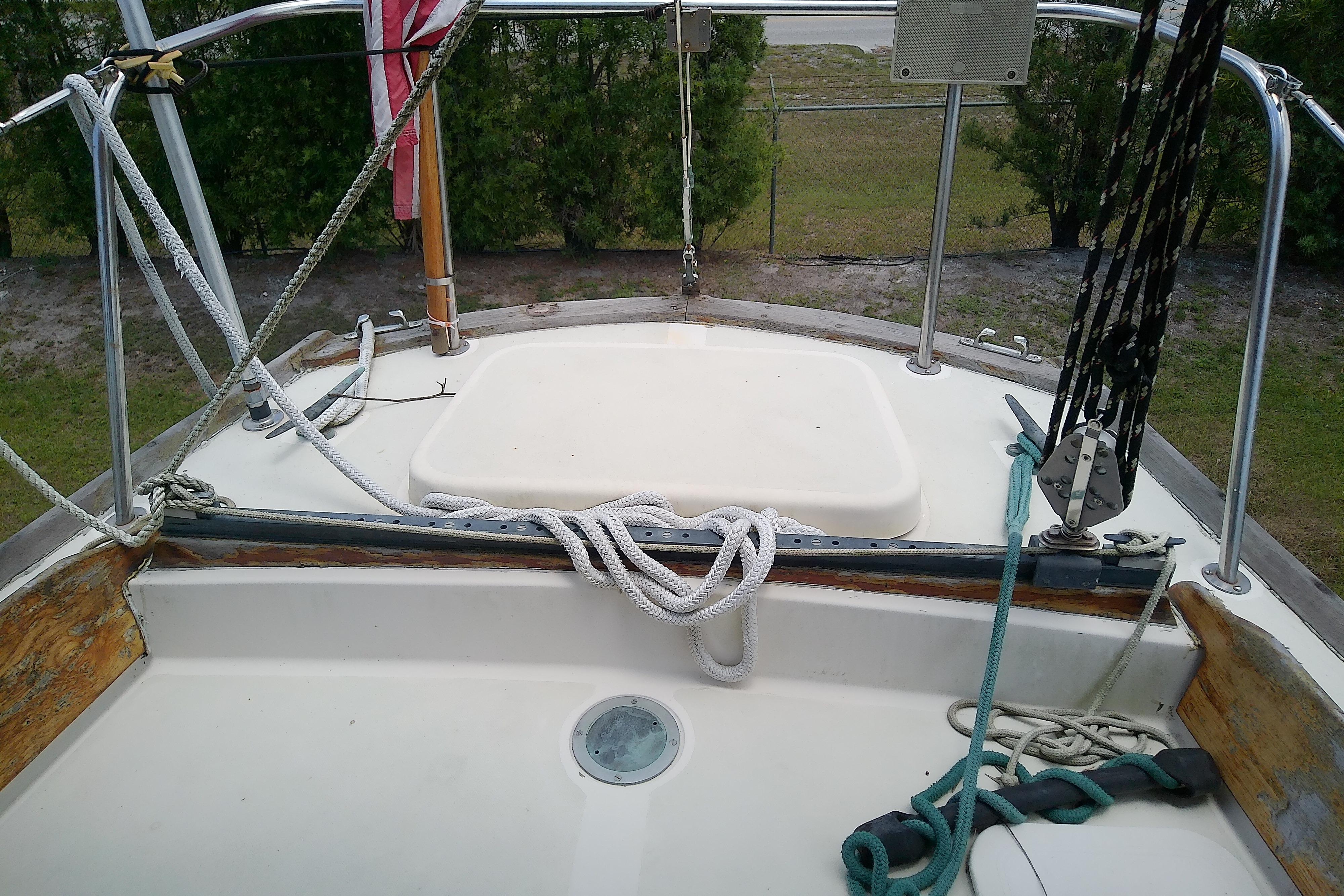 1981 Sea Sprite 34 sailboat deck with ropes and railing, outdoor setting.