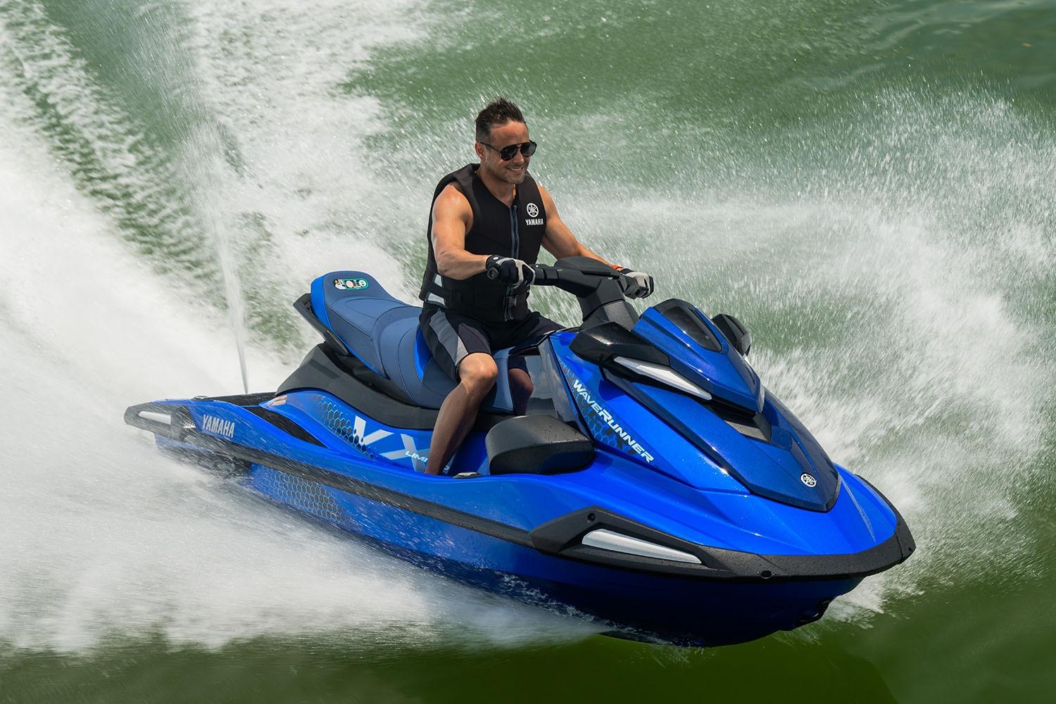 Manufacturer Provided Image: Man riding 2026 Yamaha WaveRunner VX Limited on water, creating dynamic splashes.