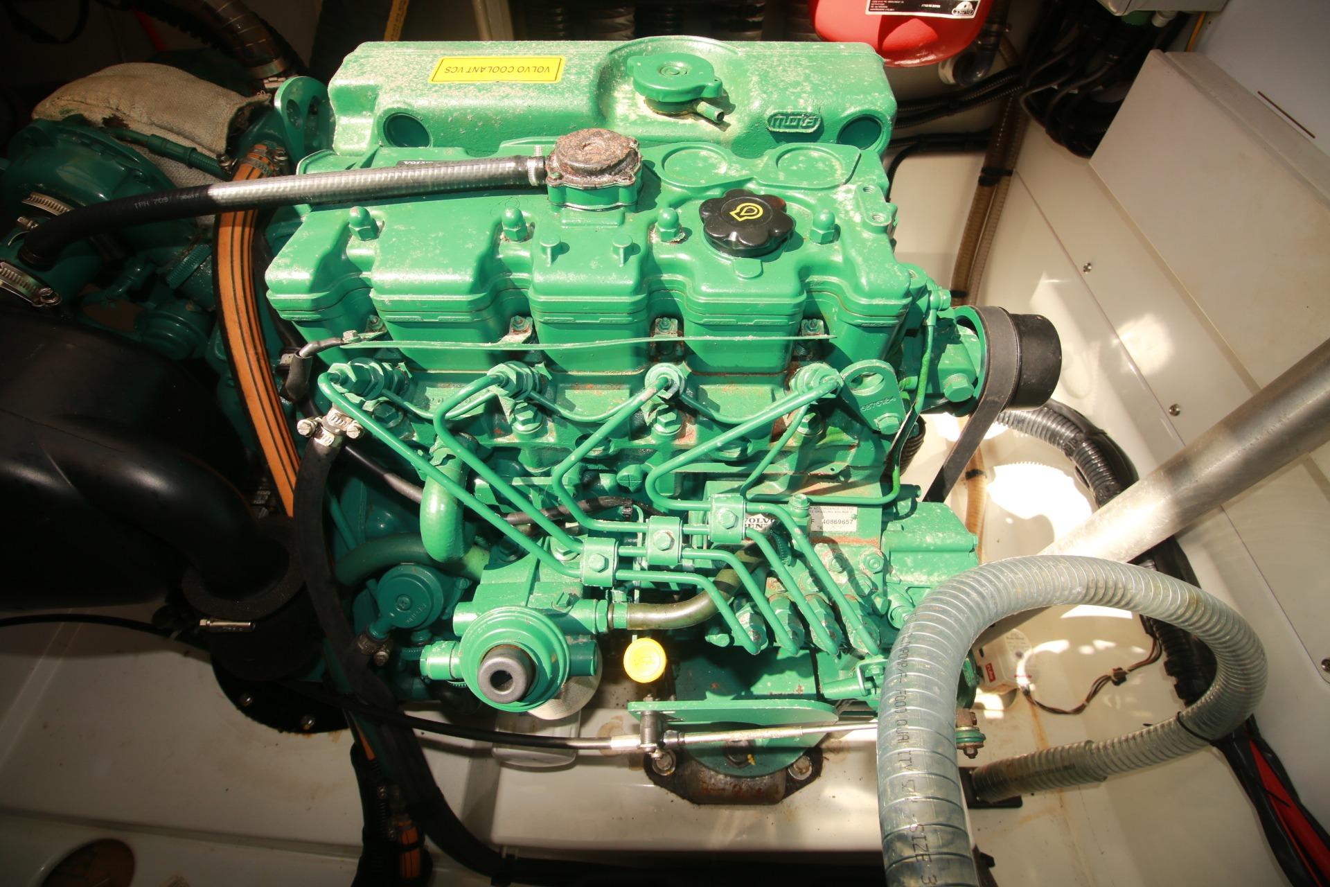 Engine compartment of 2022 Fountaine Pajot Elba 45 Catamaran, featuring a green marine engine.
