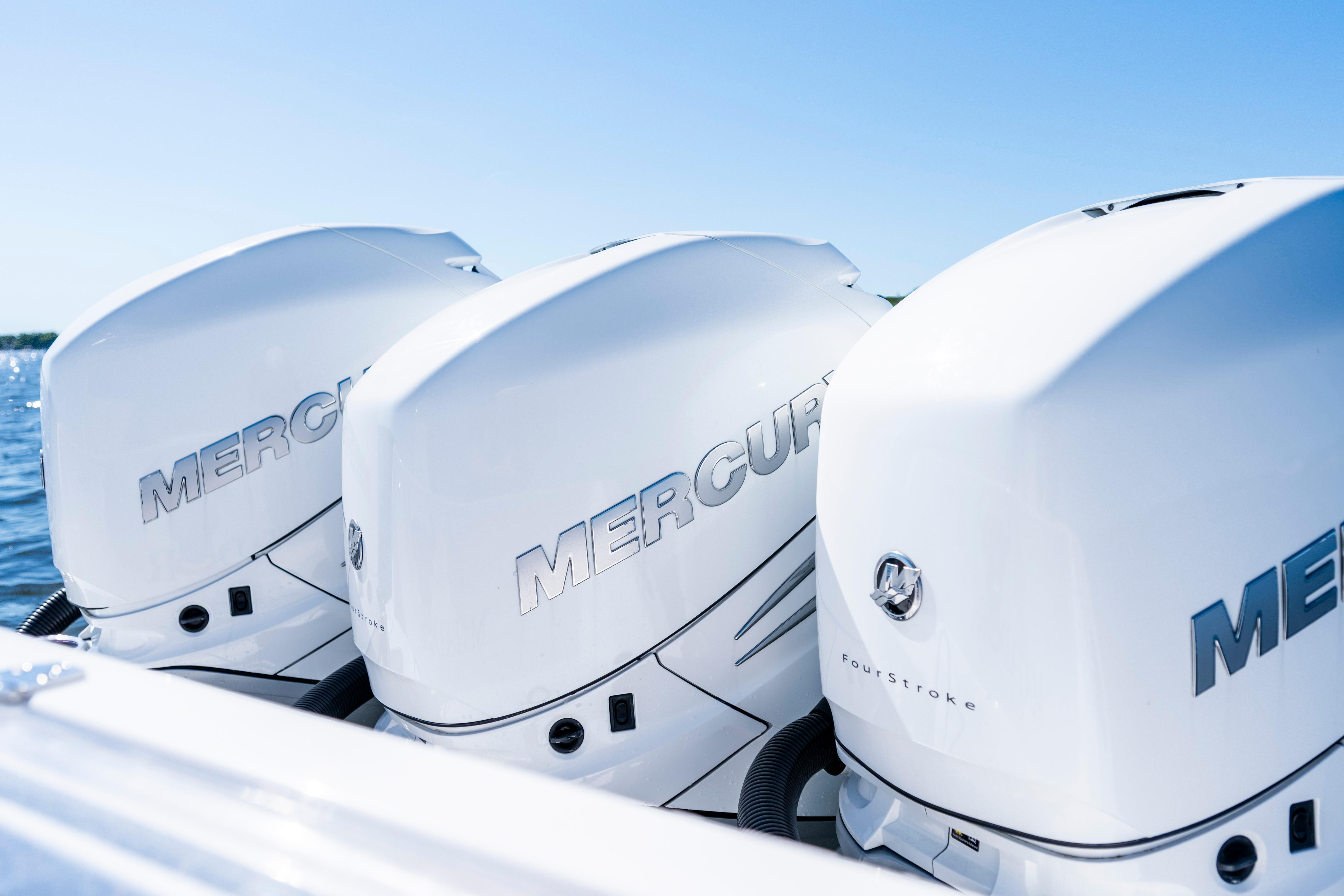 Triple Mercury outboard engines on a 2015 Contender 39 ST boat.