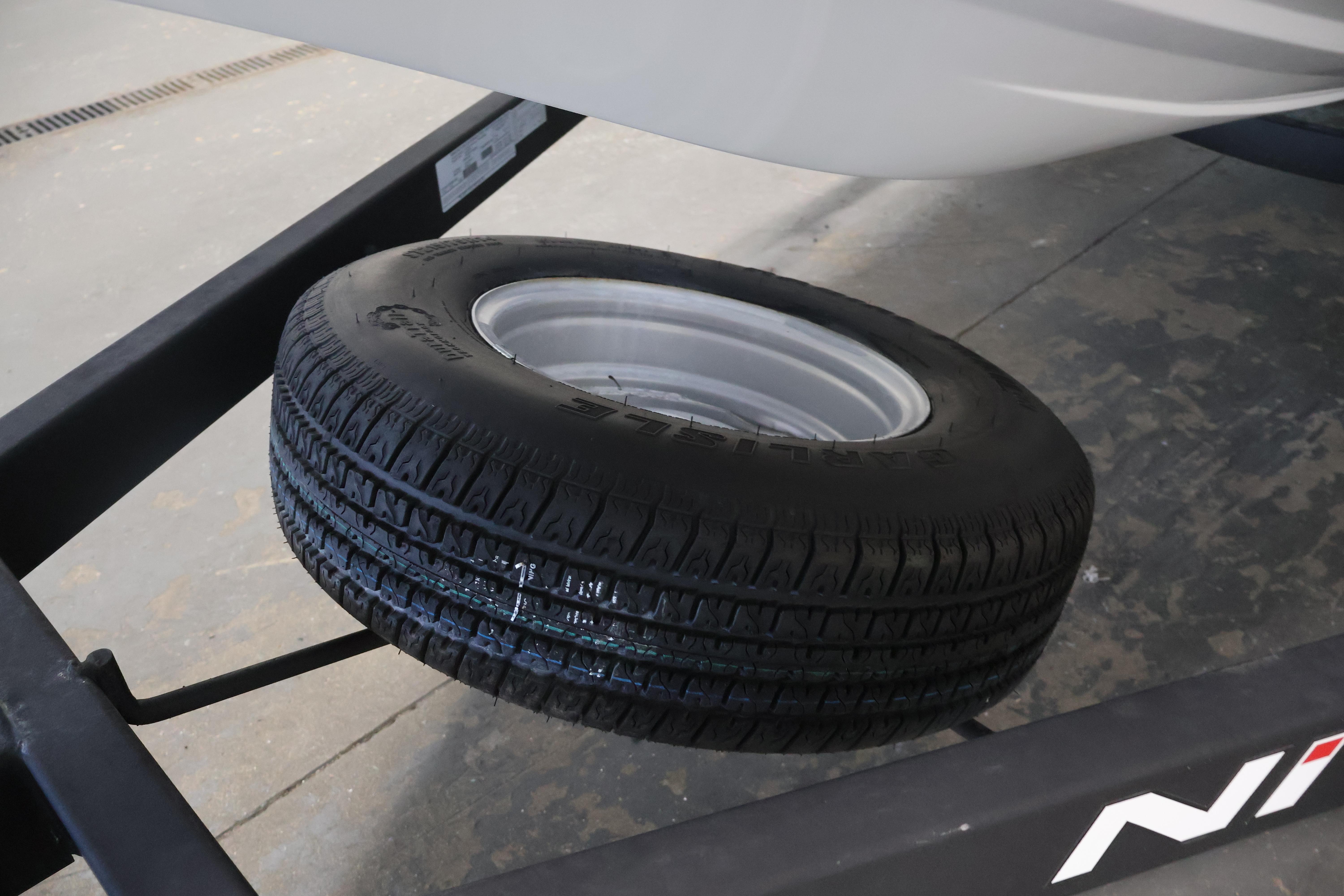 Spare tire mounted on a 2019 Nitro Z19 Sport trailer.