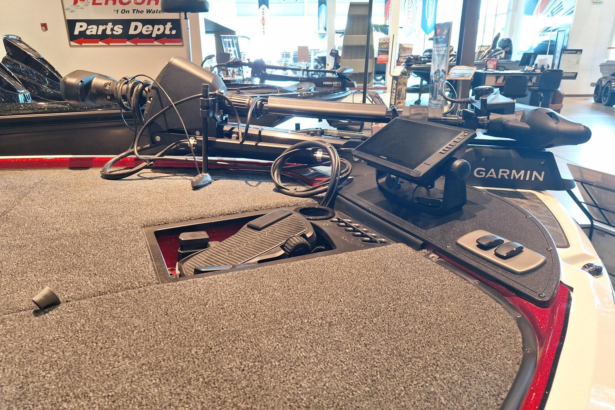 2026 Nitro Z19 XL Pro boat with Garmin navigation system in showroom.