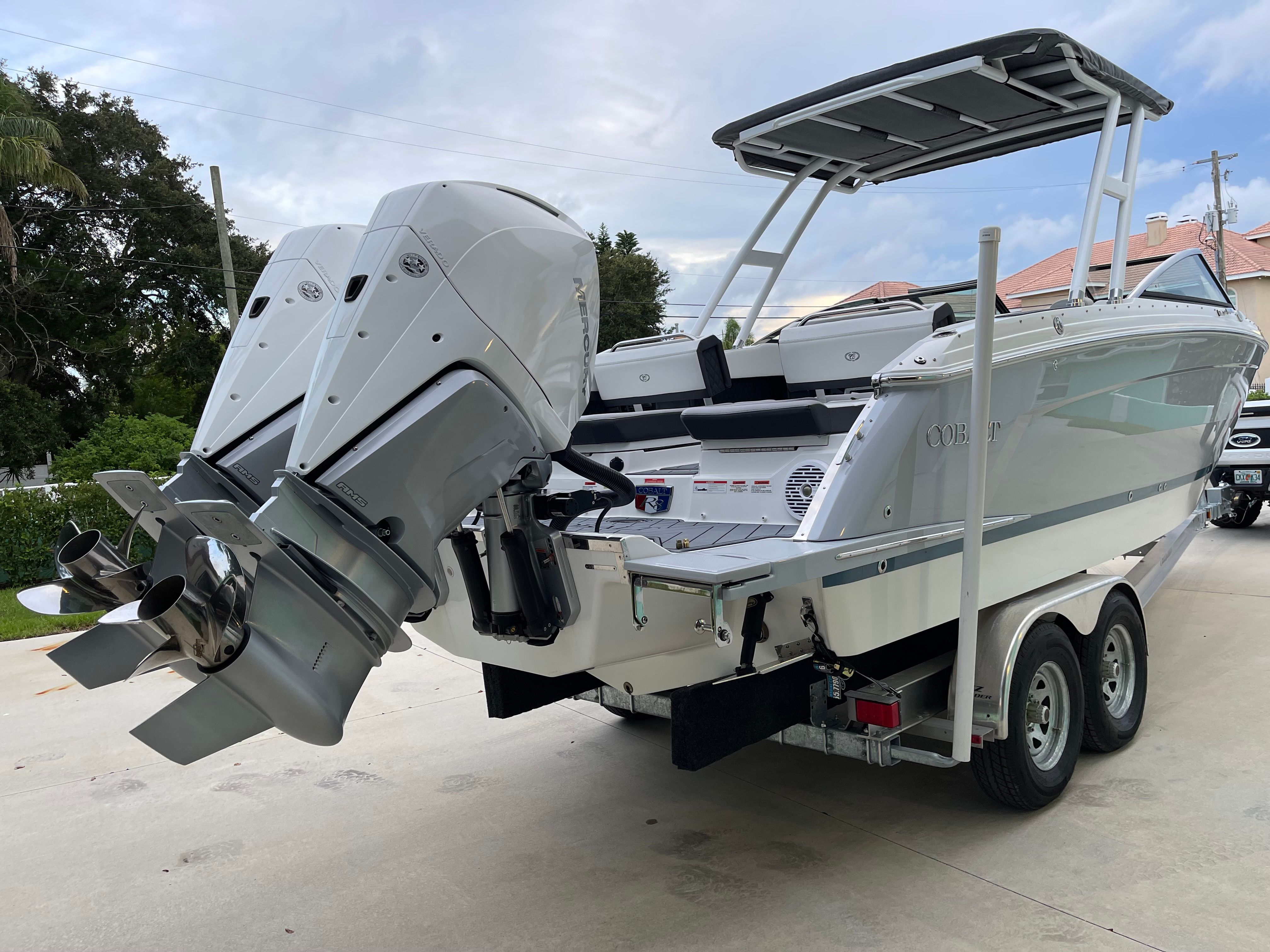 2022 Cobalt R8 Outboard on trailer, dual outboard engines.
