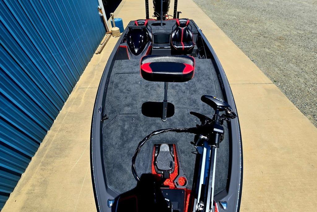 2026 Skeeter ZXE20 fishing boat with modern seating and equipment on a concrete surface.