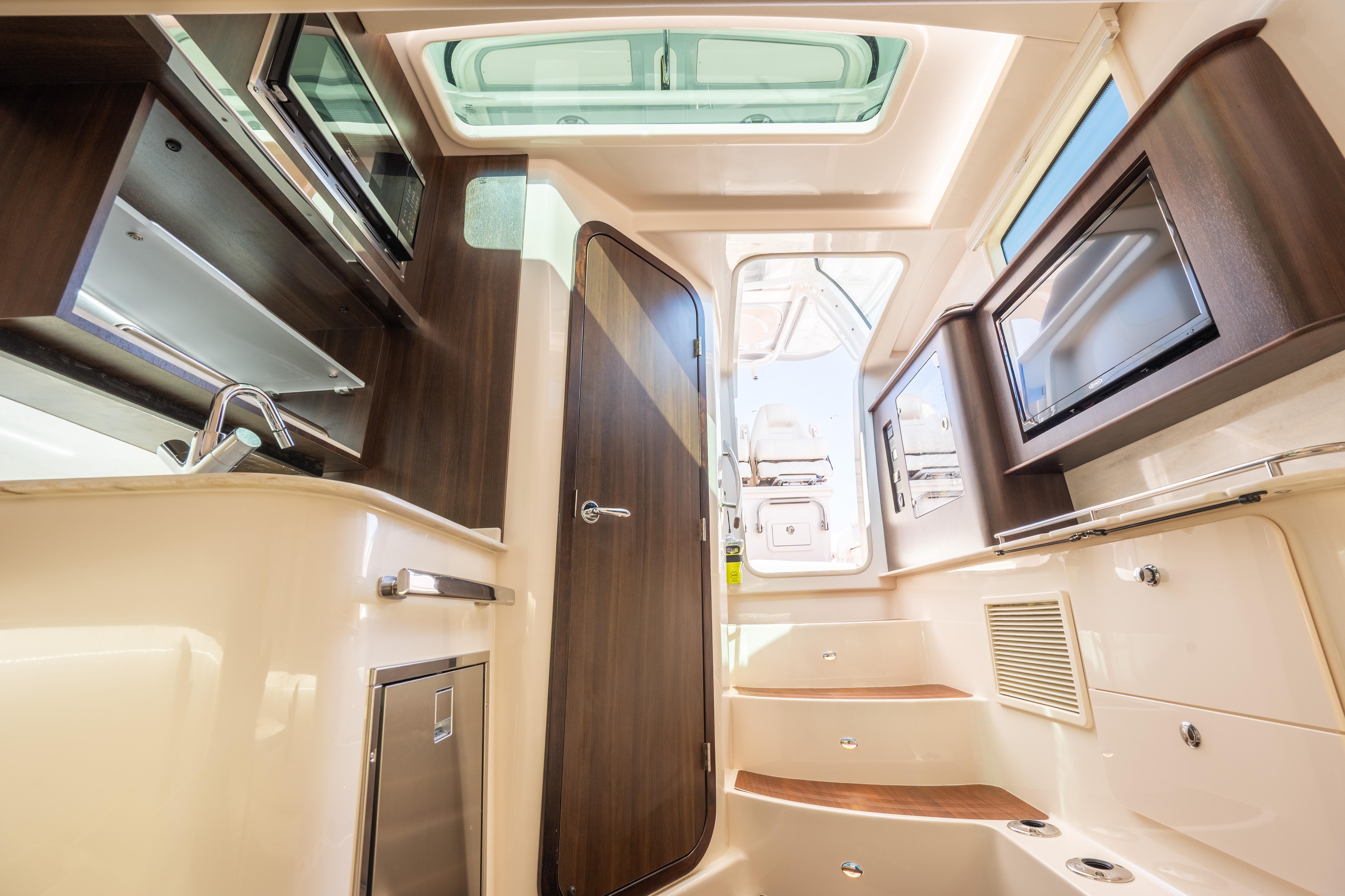 Interior of 2025 Grady-White Canyon 386 boat, featuring modern amenities and sleek design.