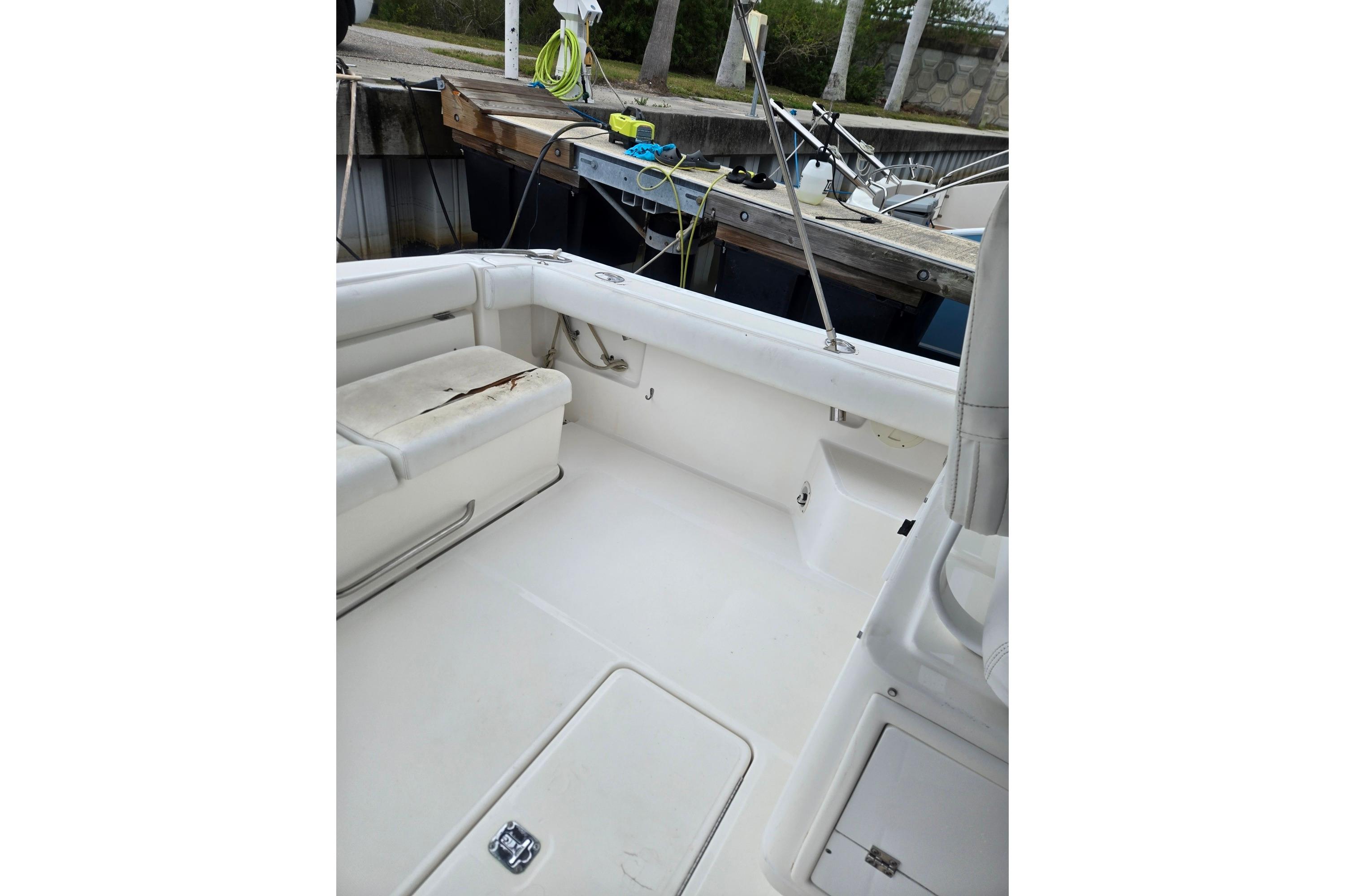 2002 Tiara Yachts 3500 Open boat interior with white seating and clean deck.