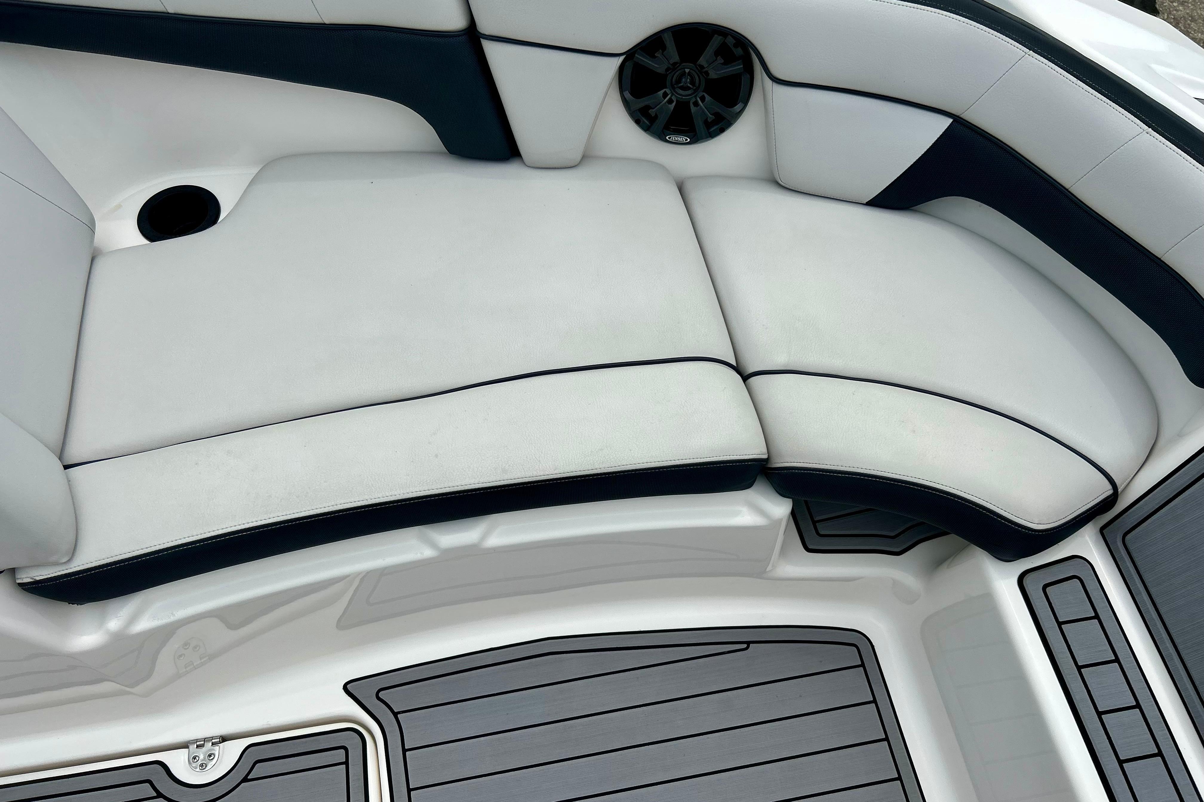 2015 Yamaha AR210 boat interior with cushioned seating and speaker detail.