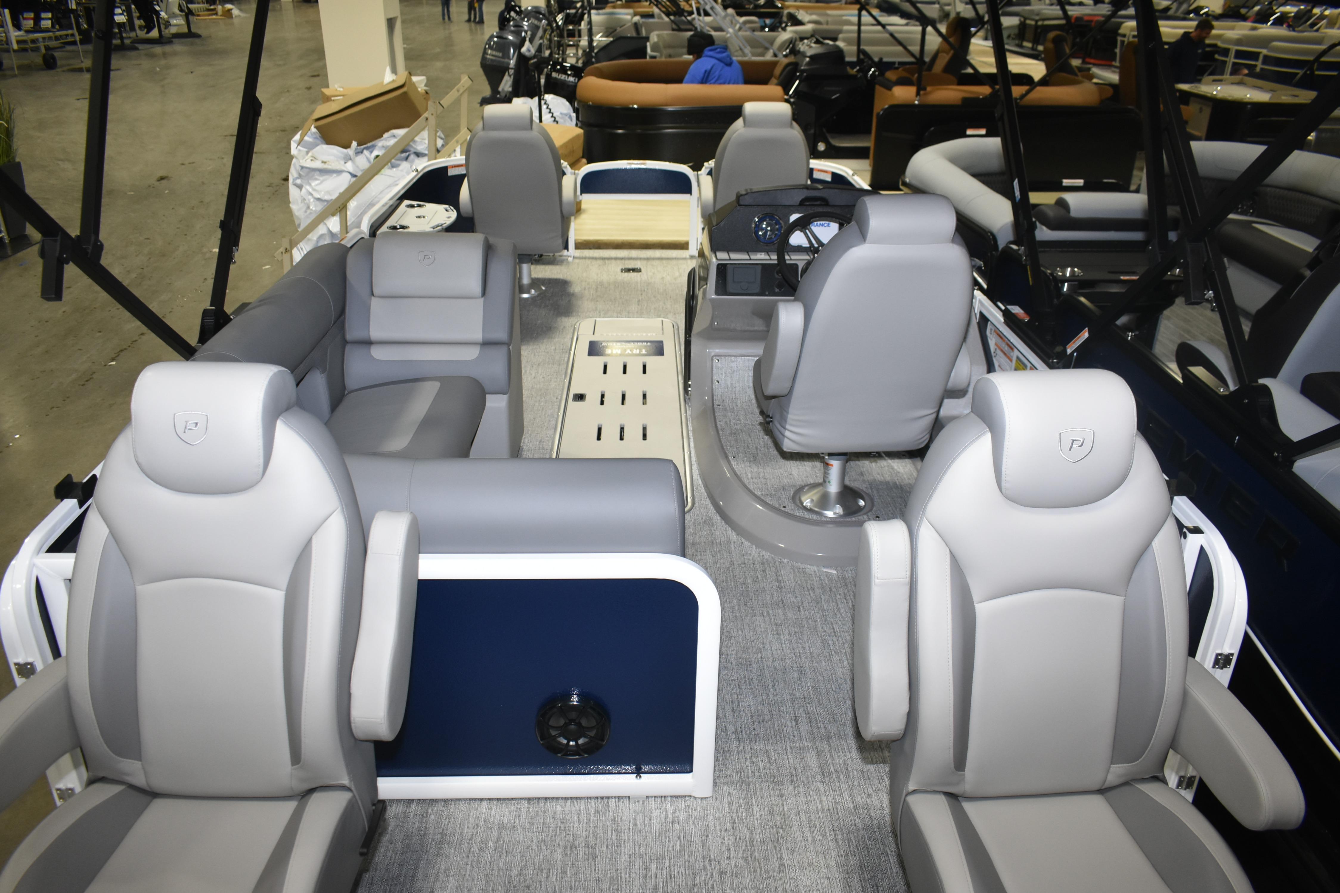 2026 Premier 230 Sunsation Angler 4PT PTX interior with plush seating and modern helm.