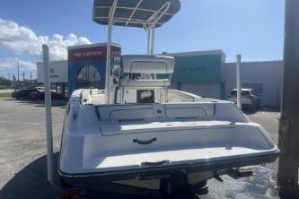 2016 Yamaha Boats 190 FSH Sport, rear view, parked outdoors under clear sky.