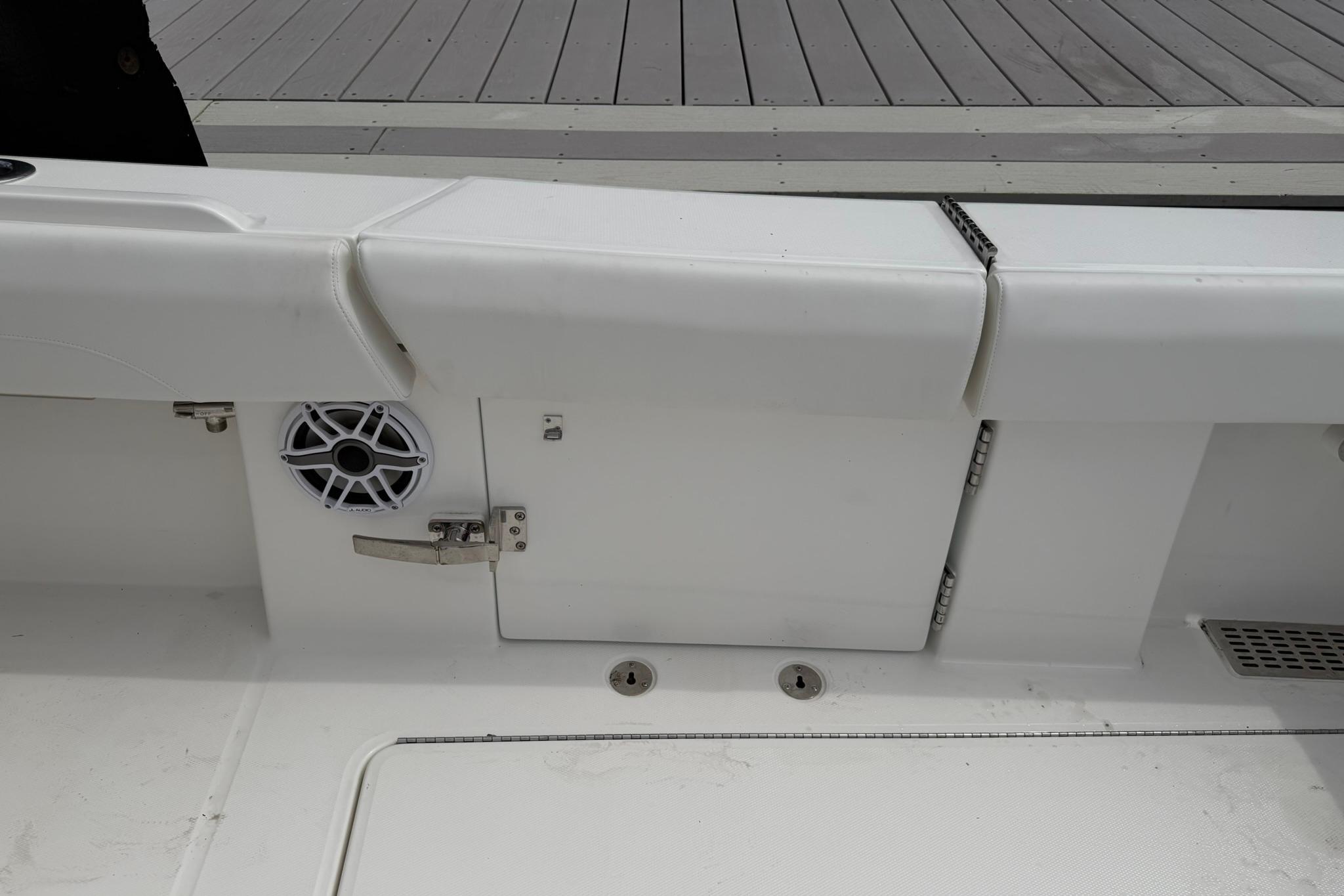 2026 Regulator 37 boat interior with speaker and storage compartment.