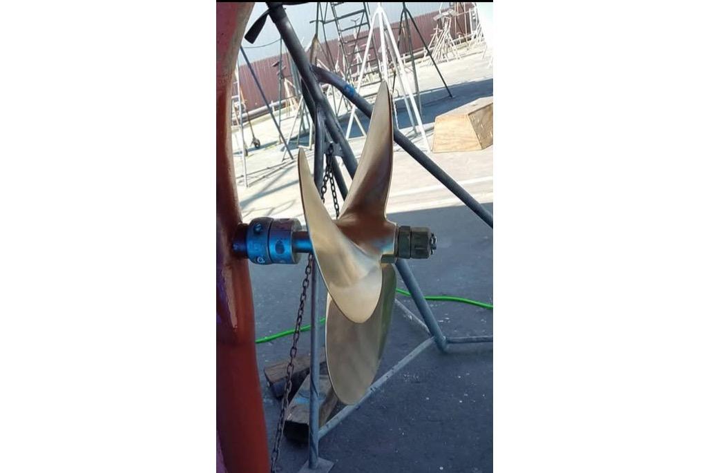 Propeller of a 1977 Morgan Out Island 51 sailboat in a shipyard.