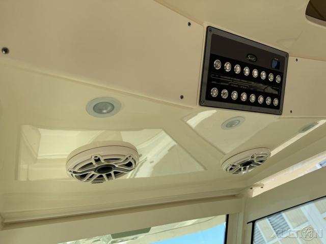 2022 Scout 330 LXF boat interior ceiling with speakers and control panel.