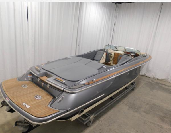 2021 Chris-Craft Corsair 34 boat in an indoor setting.