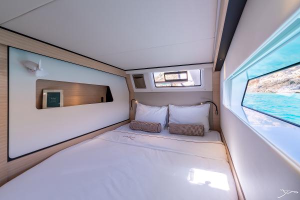 Luxurious cabin interior of 2025 Nautitech 44 Open yacht with scenic ocean view.