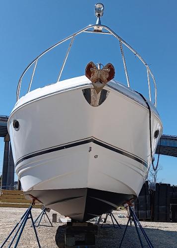 2004 Chaparral Signature 350 boat on stands, viewed from the front.