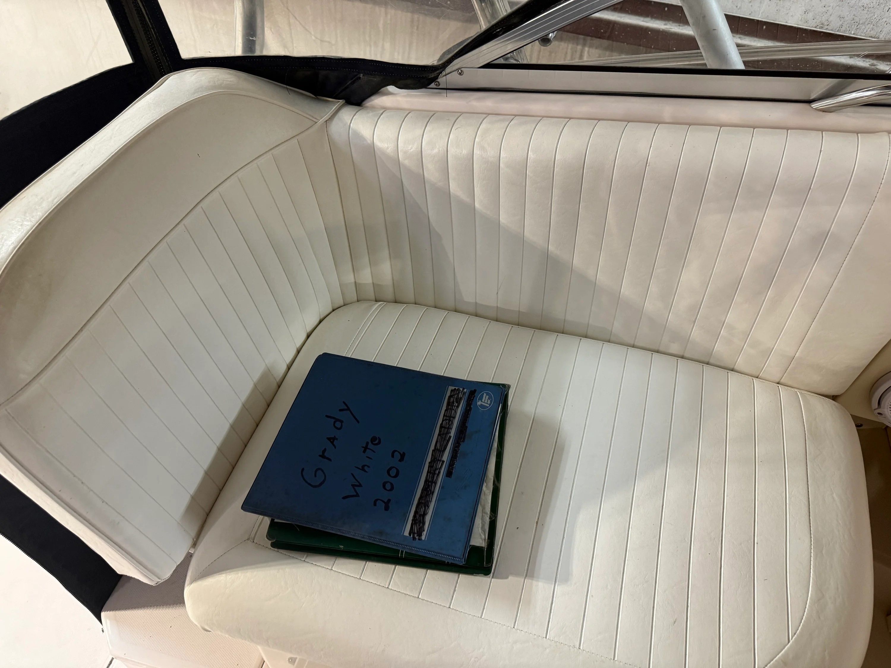 Grady-White Marlin 300 manual on white seat, 2002 model.