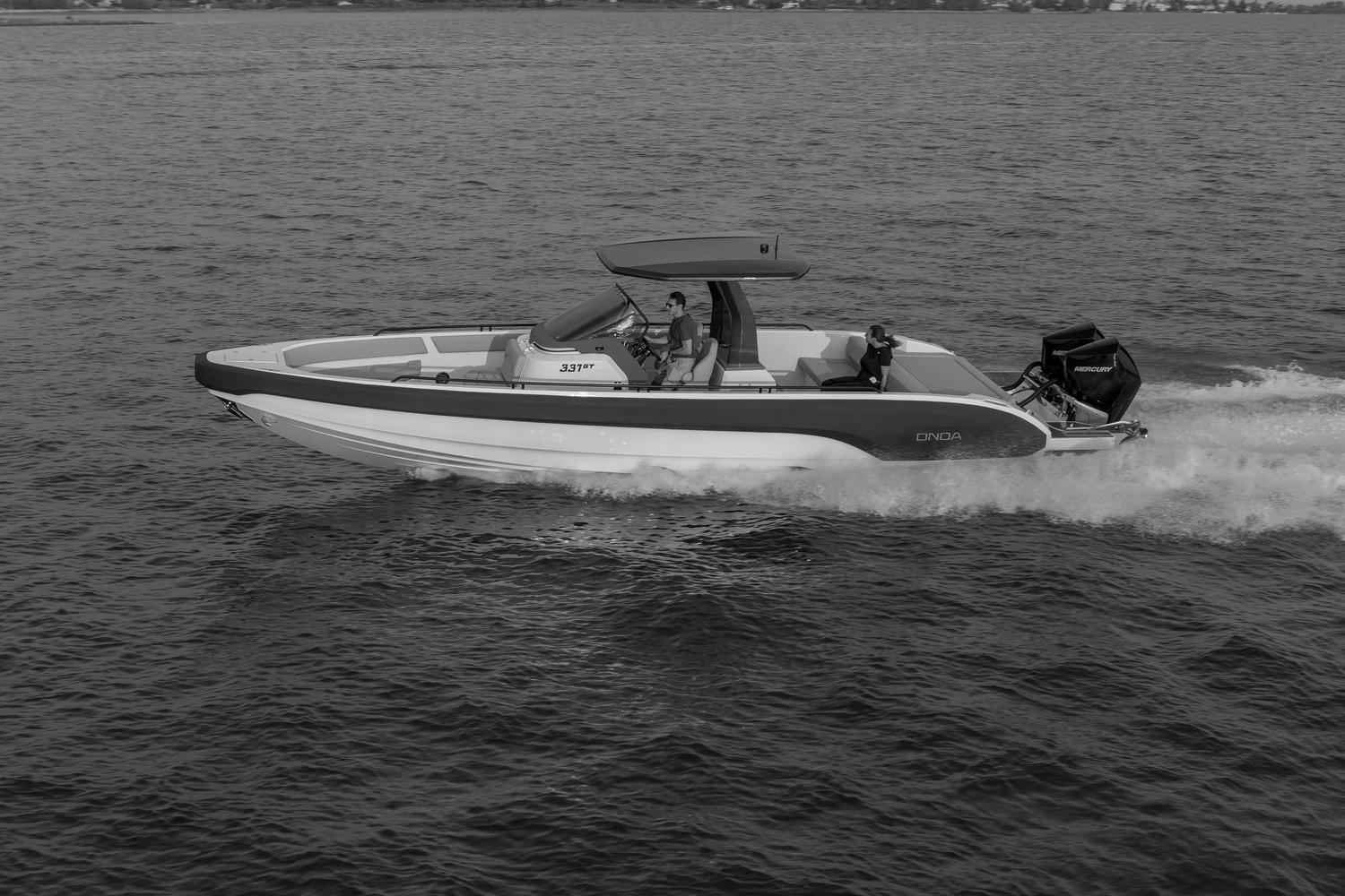2021 Onda 371GT boat cruising on open water, side view.