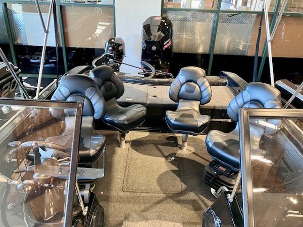 2024 Nitro ZV19 Pro boat interior with four black cushioned seats and modern design.