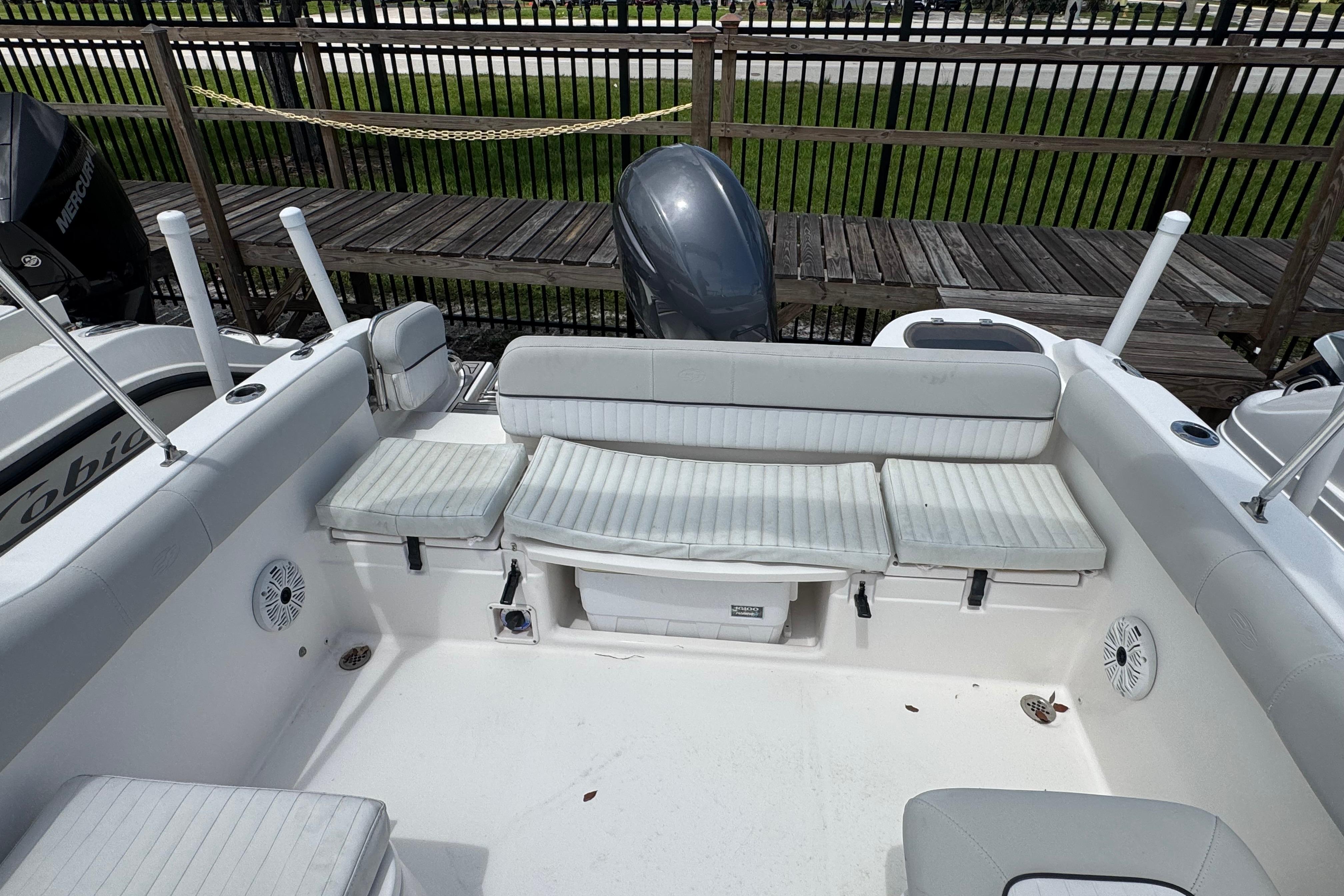 2020 Sea Fox 226 Traveler boat interior with cushioned seating and storage.