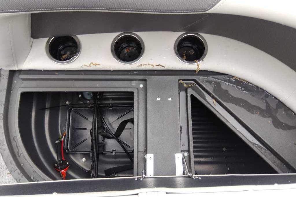 Open storage compartment on 2026 Sun Tracker Bass Buggy 16 XL Select boat.