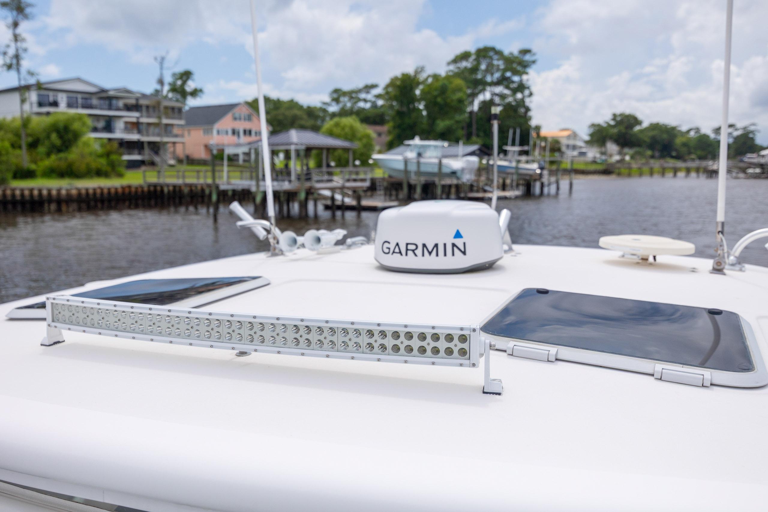 2004 Tiara Yachts 3200 Open with Garmin equipment on deck, dockside view.
