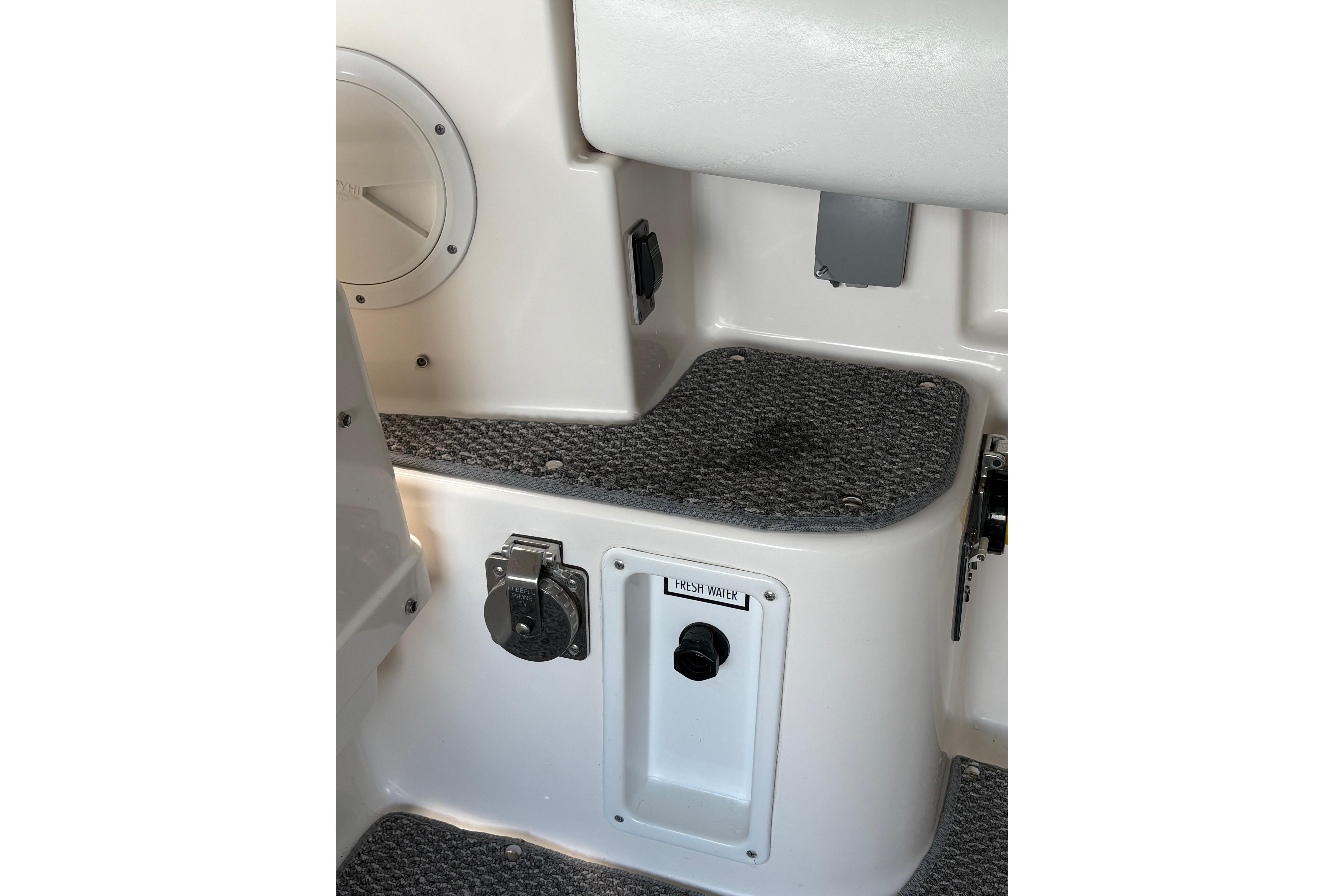 1999 Tiara Yachts 3100 Open interior detail with fresh water access.