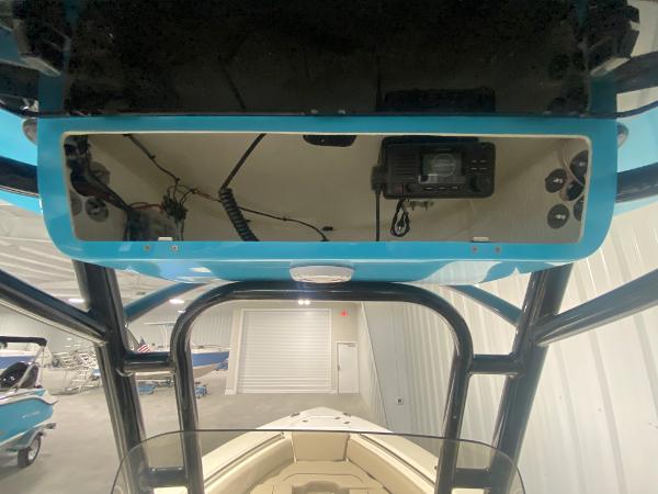 2024 Key West 219 FS boat console with electronics and storage.