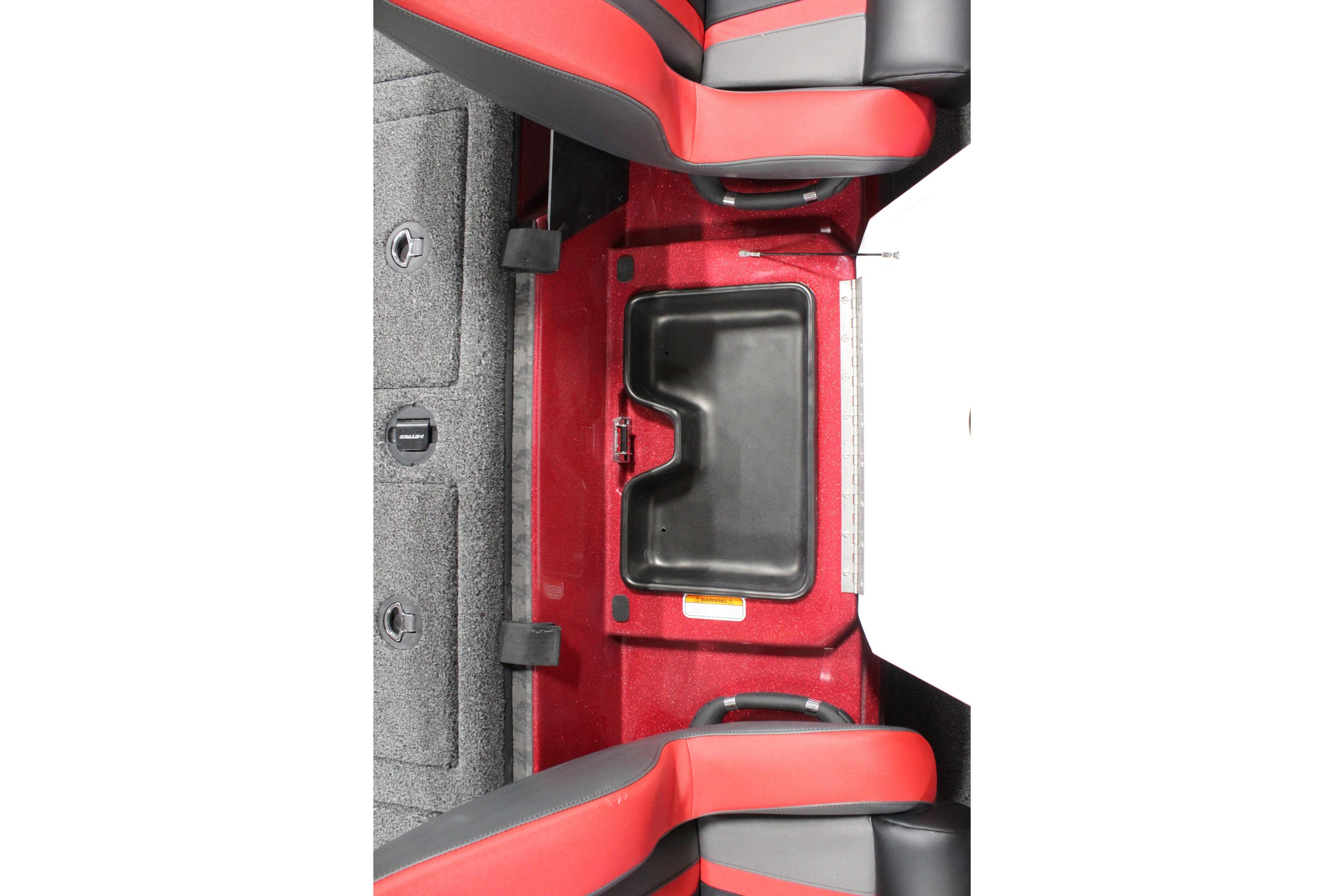 2026 Nitro Z19 XL Pro interior with red and black seating and storage compartment.