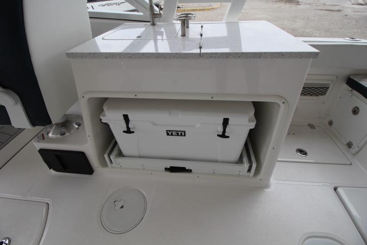 Sea Fox 268 Traveler 2026 boat with Yeti cooler storage compartment.