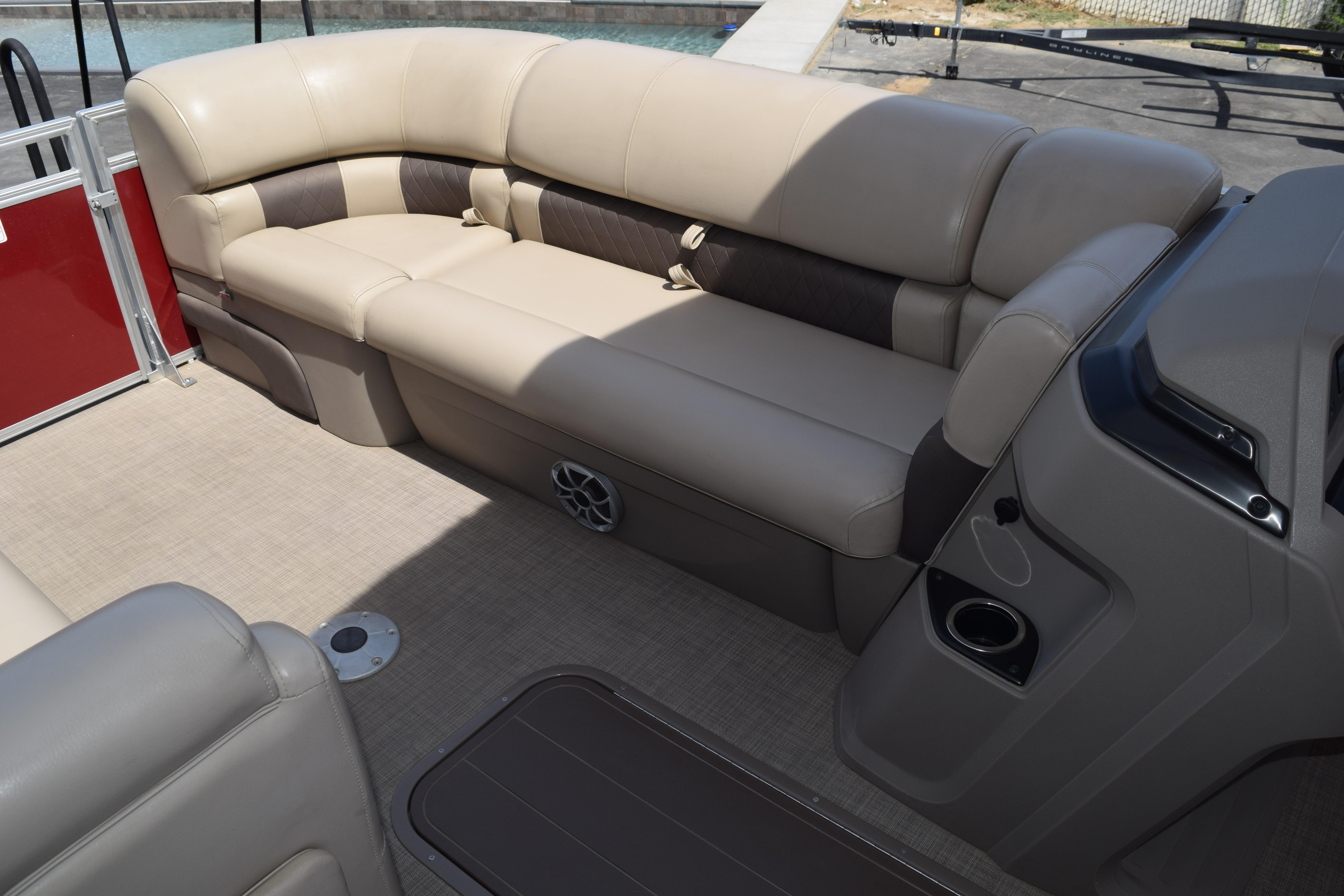 2025 Sun Tracker Party Barge 22 XP3 interior with beige seating and modern design.