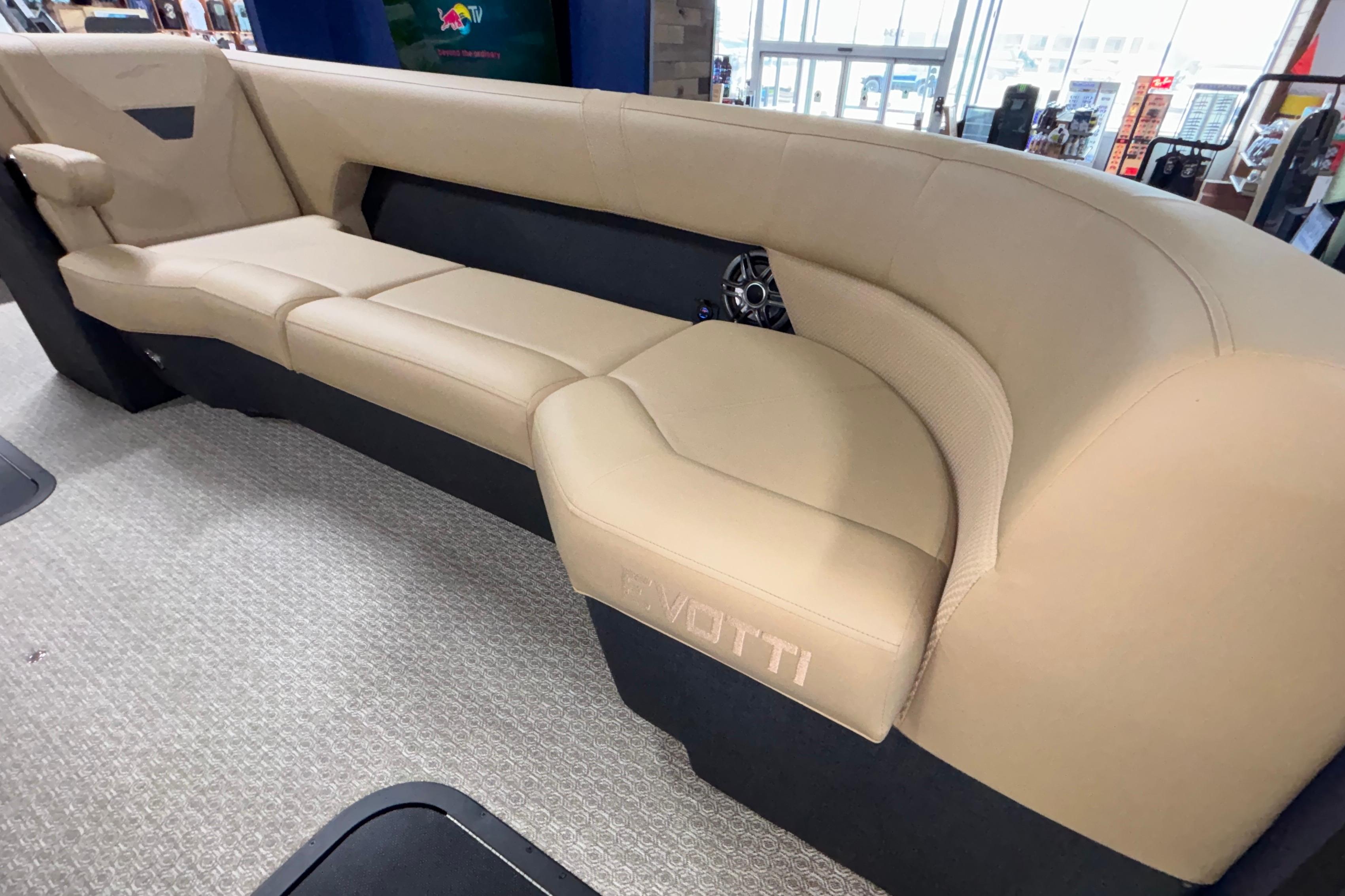 Luxurious beige seating in 2026 Evotti 525QL boat interior.