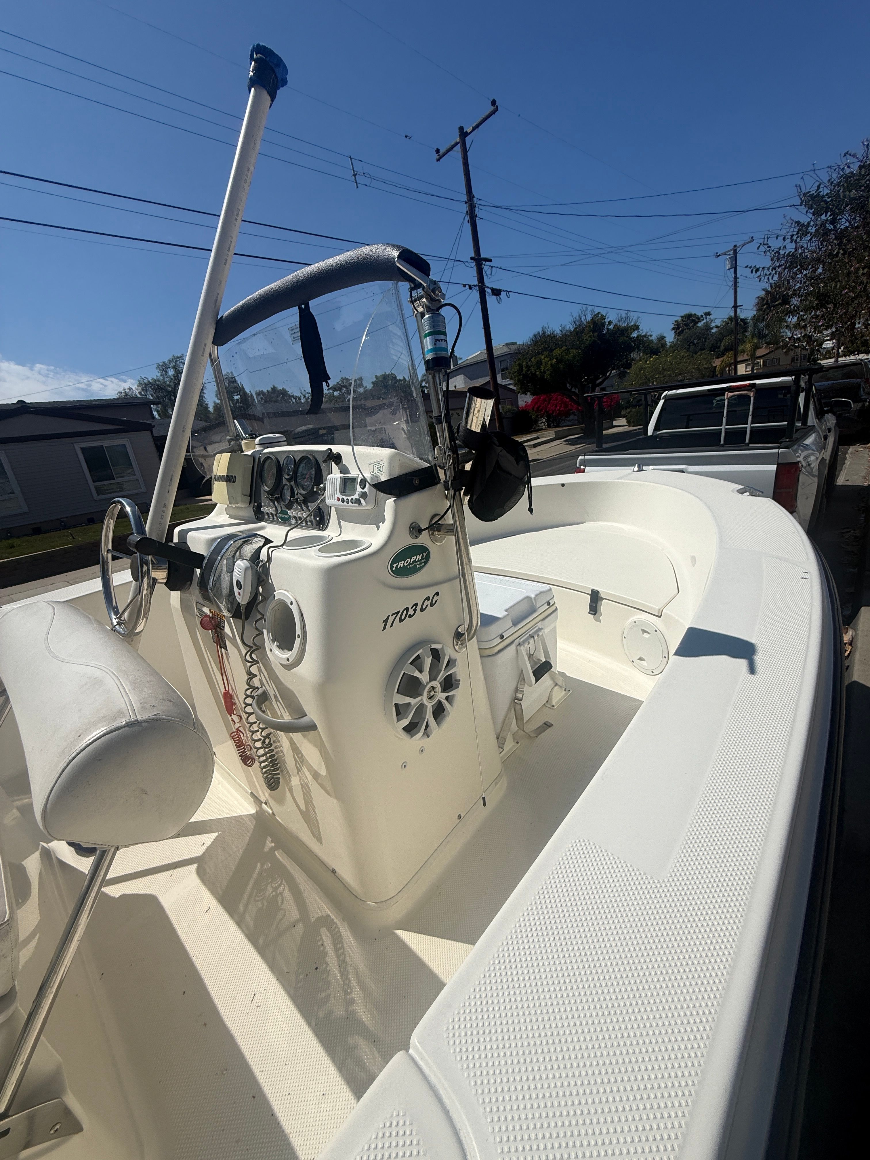2008 Trophy 1703 Center Console boat parked outdoors.
