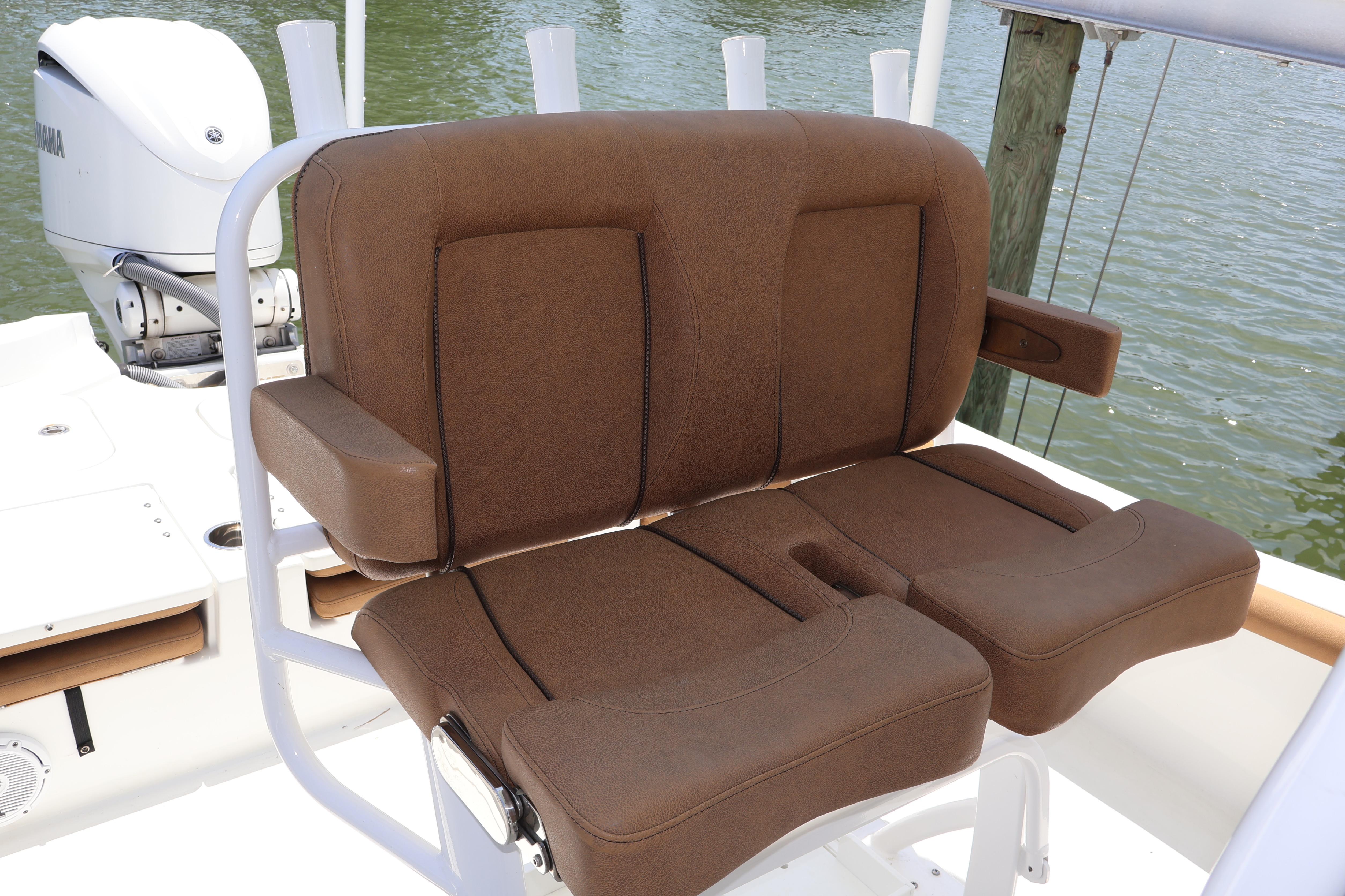 Brown seating on 2022 Sea Hunt BX 25 FS boat, with Yamaha engine in background.