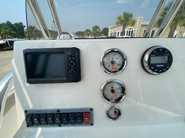 2024 Key West 203 FS boat dashboard with Garmin GPS and Clarion audio system.