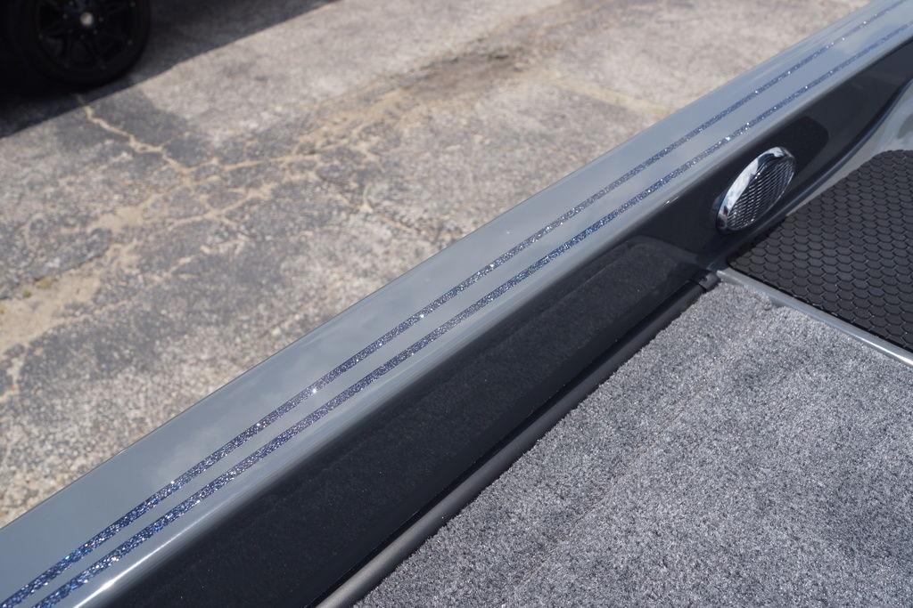 Close-up of 2027 Phoenix 921 Elite X II boat deck with textured surface and sleek design.