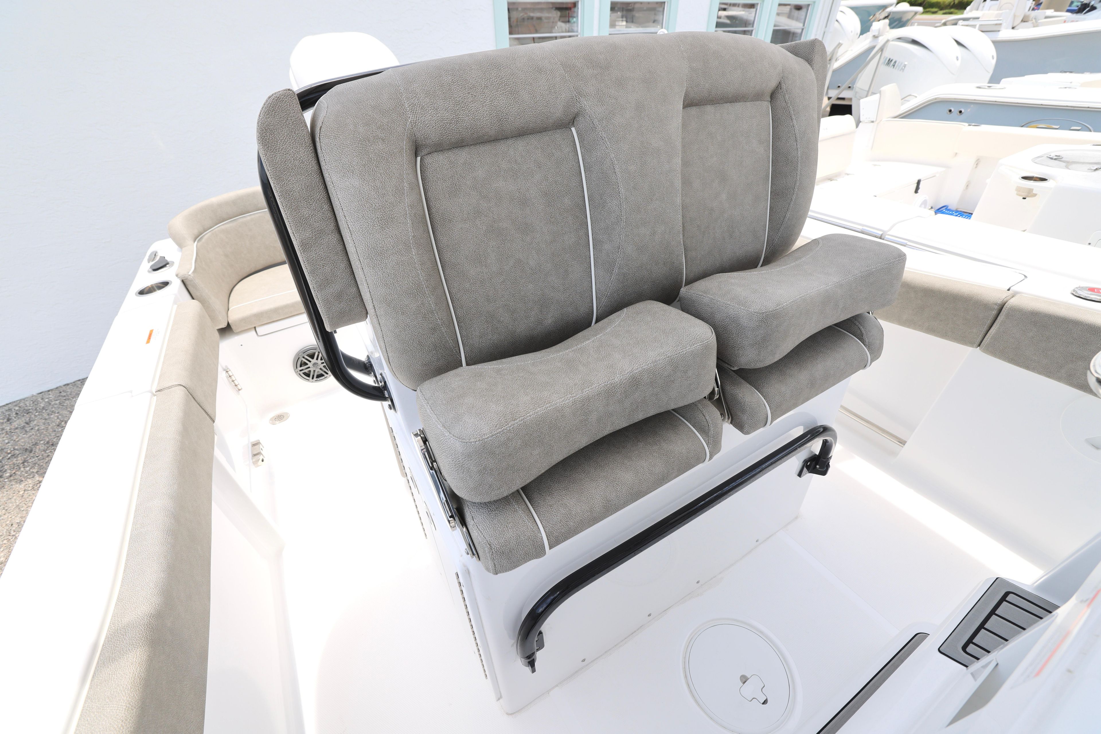 2026 Sea Hunt Ultra 245 SE boat with cushioned seating and sleek design.