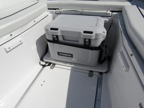 2024 Wellcraft 263 Fisherman boat interior with Dometic cooler.