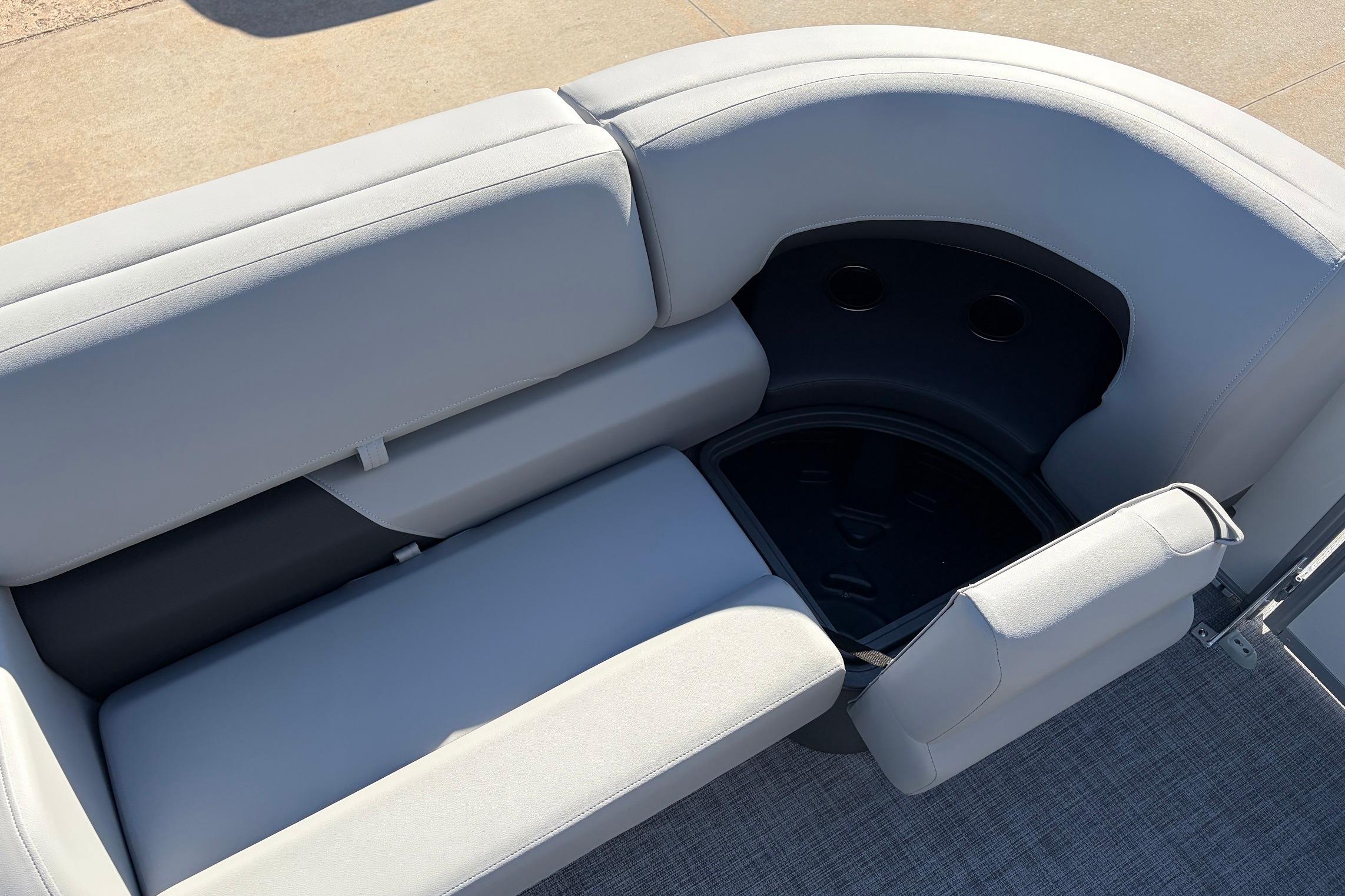 2026 Sun Tracker Party Barge 22 RF XP3 with spacious seating and storage compartment.