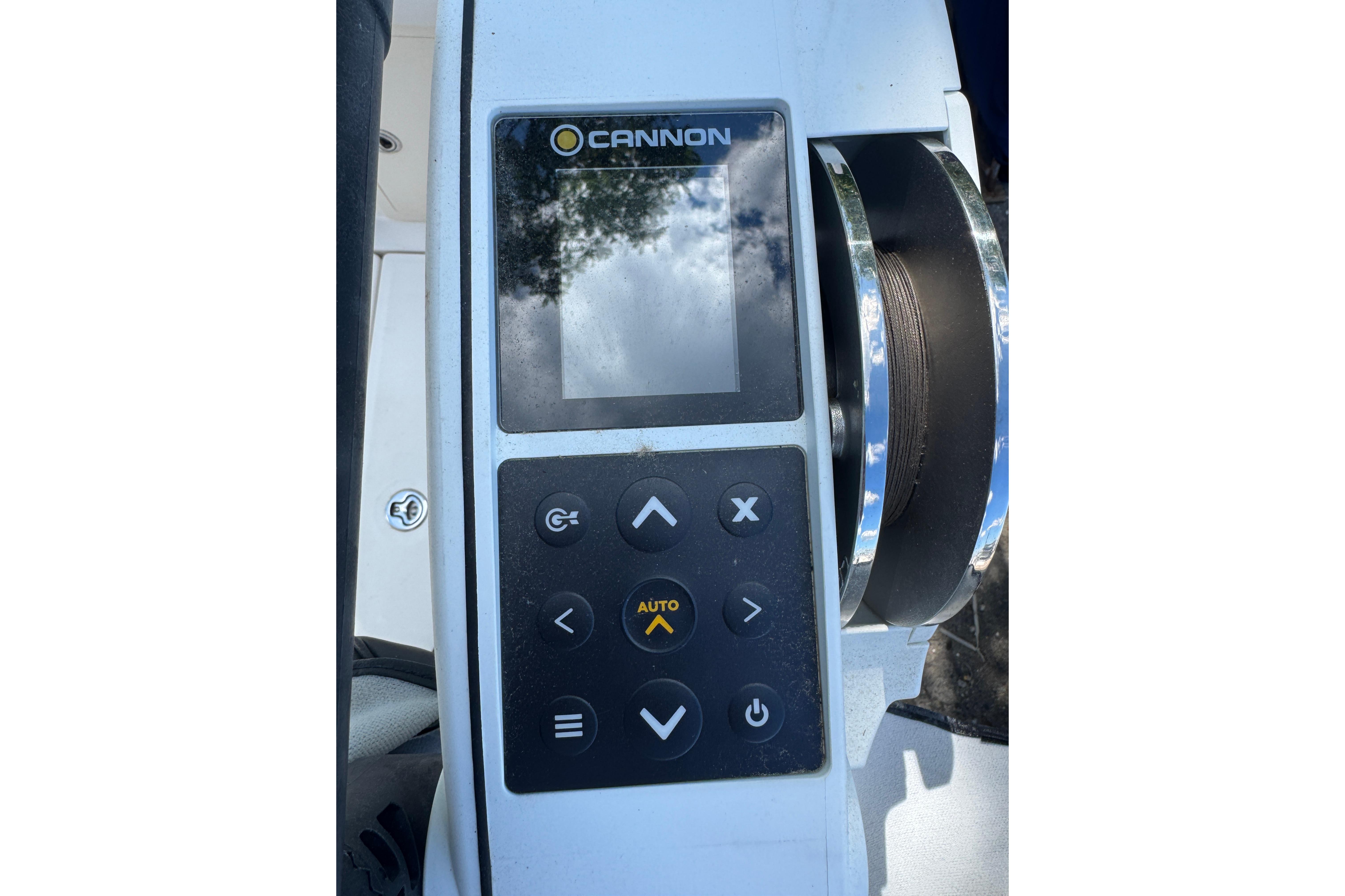 Control panel of a 2014 Boston Whaler 250 Outrage boat with Cannon display.