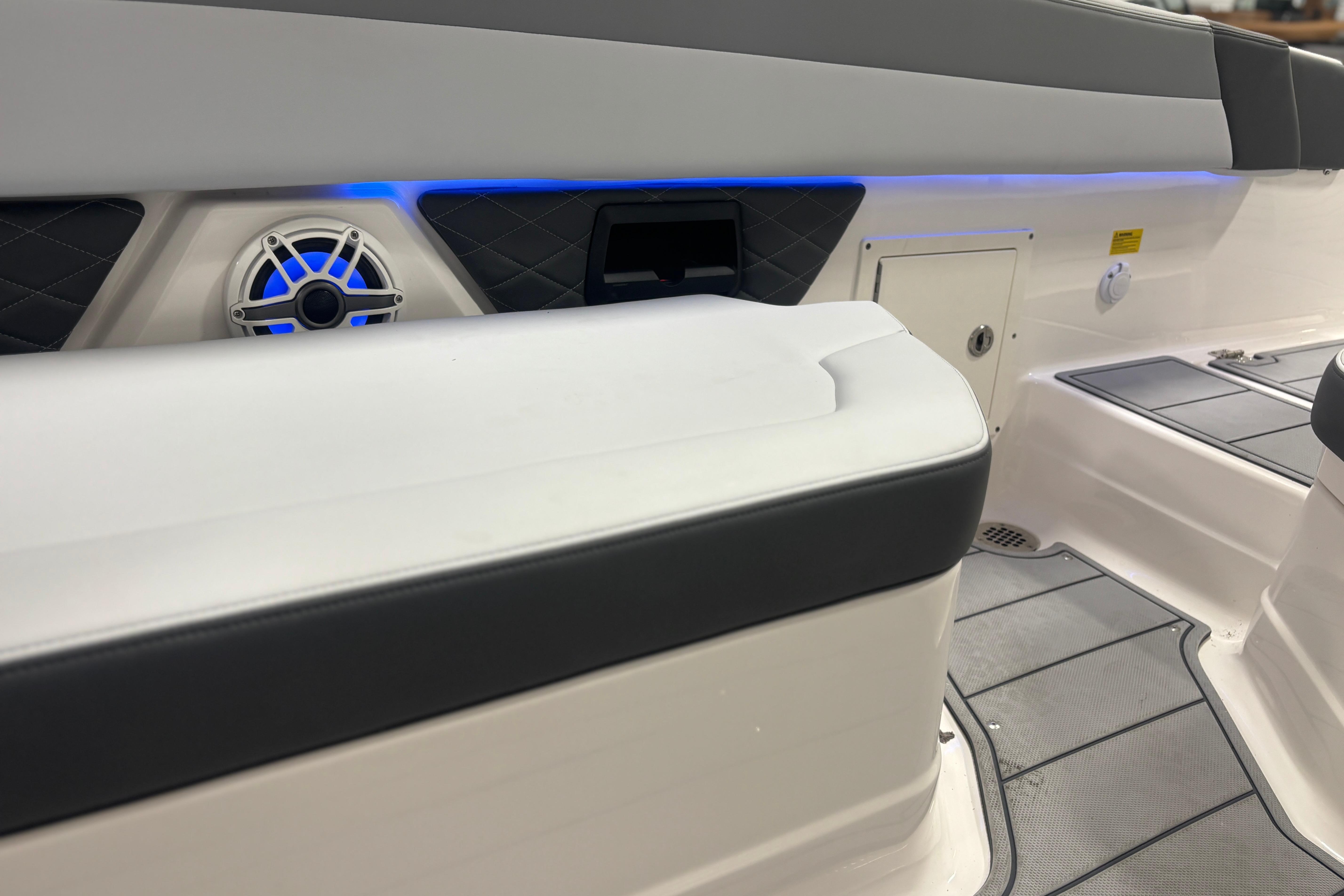 Interior of 2026 Chaparral SSX 30 boat with seating and speaker system.