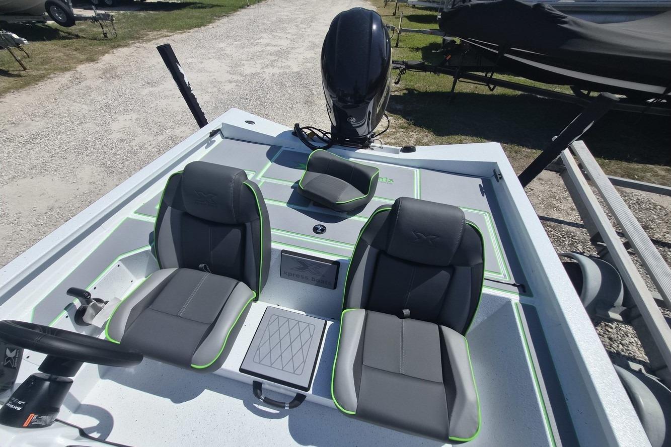 2026 Xpress H18 boat interior with sleek seating and modern design.
