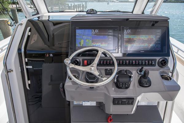Manufacturer Provided Image: 2018 Pursuit S 368 Sport boat helm with dual navigation screens.