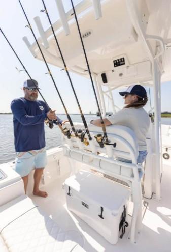 Two people fishing on a 2026 Sea Fox 228 Commander boat.