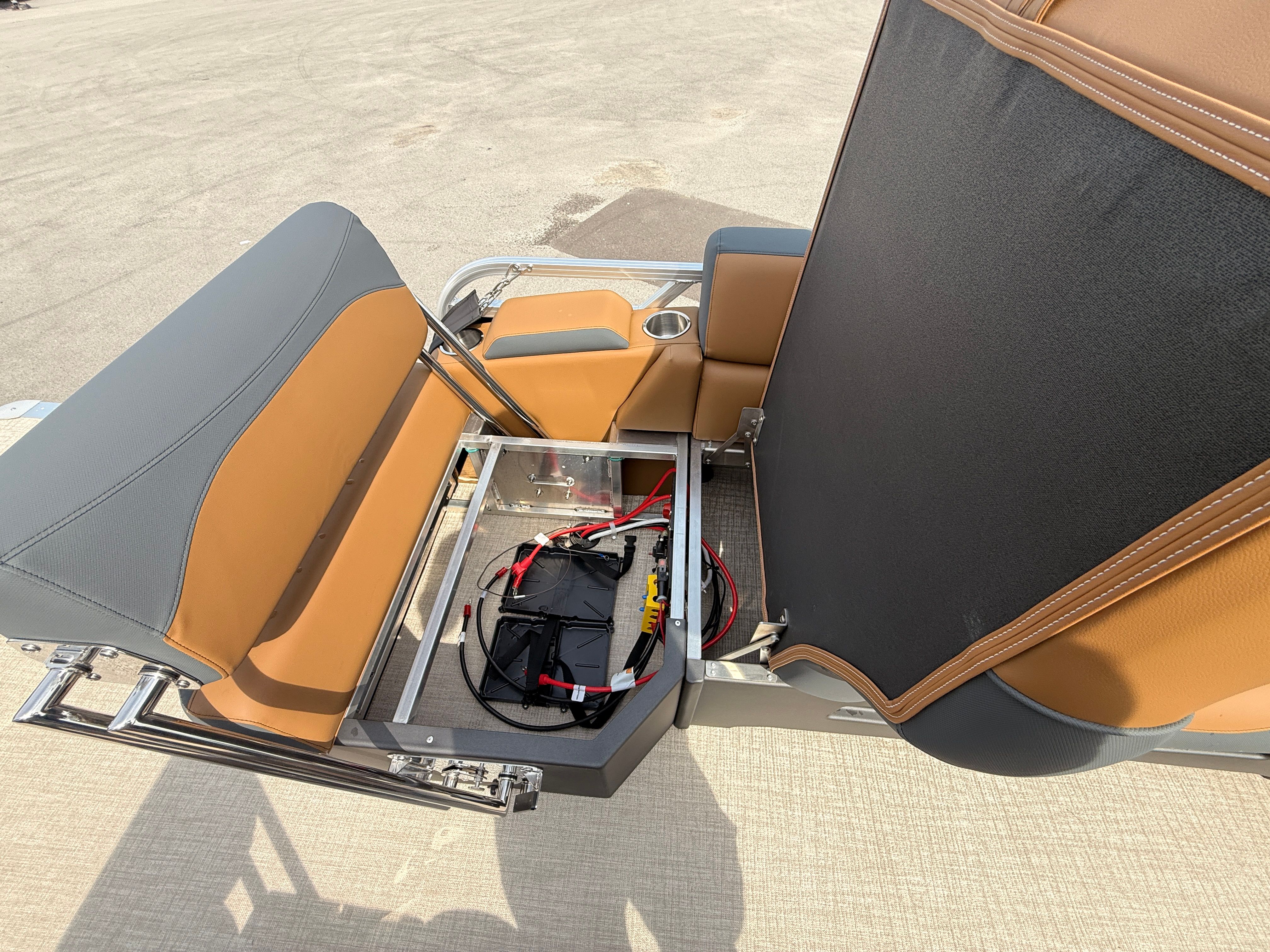 Avalon 2385 LSZ 2026 seat with open battery compartment.