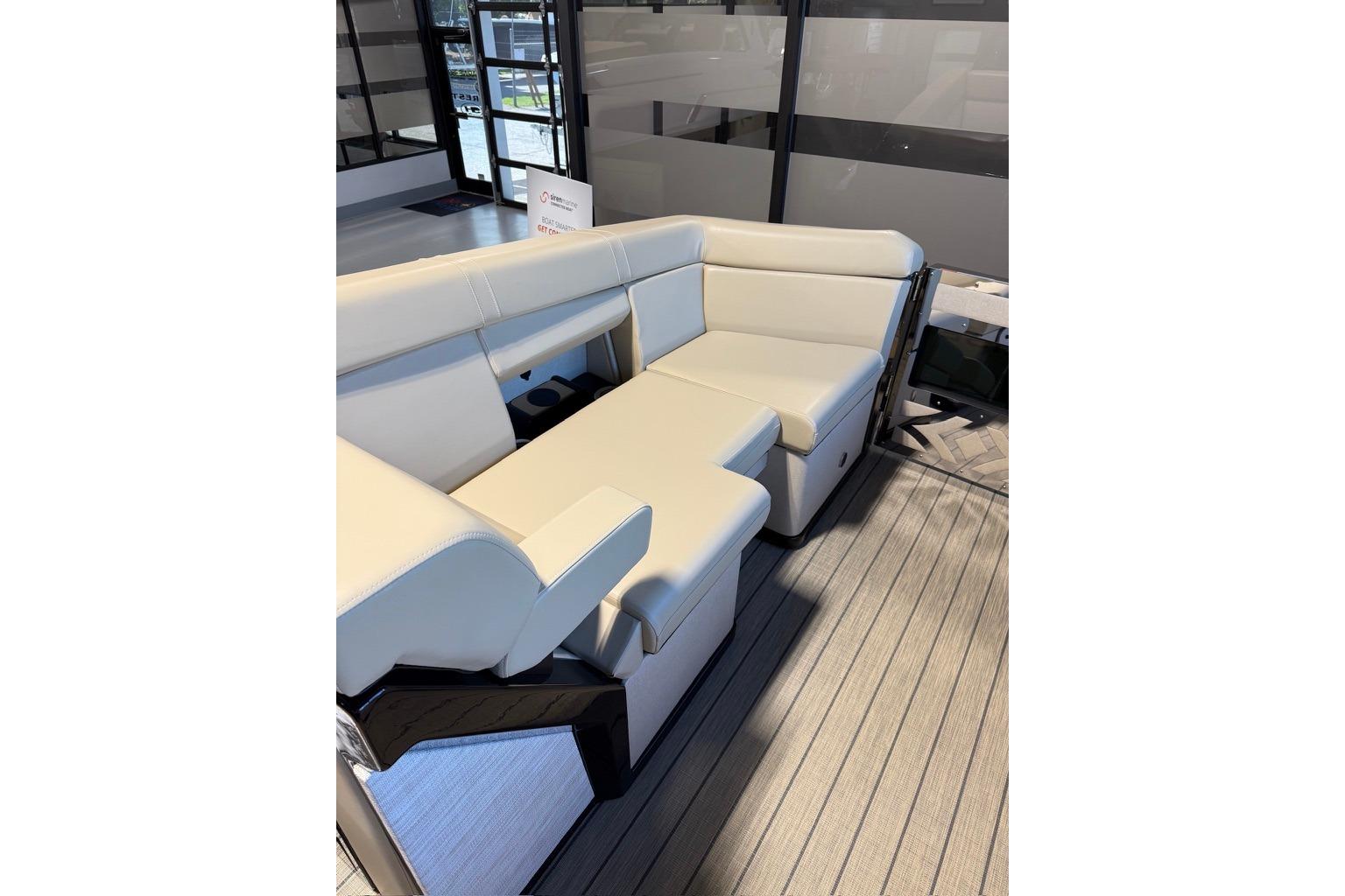 Luxurious seating on the 2026 Balise Halo 26C Twin boat, featuring elegant white upholstery.