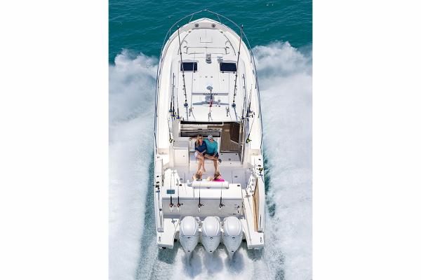 Manufacturer Provided Image: 2025 Pursuit OS 445 Offshore boat cruising on open water.